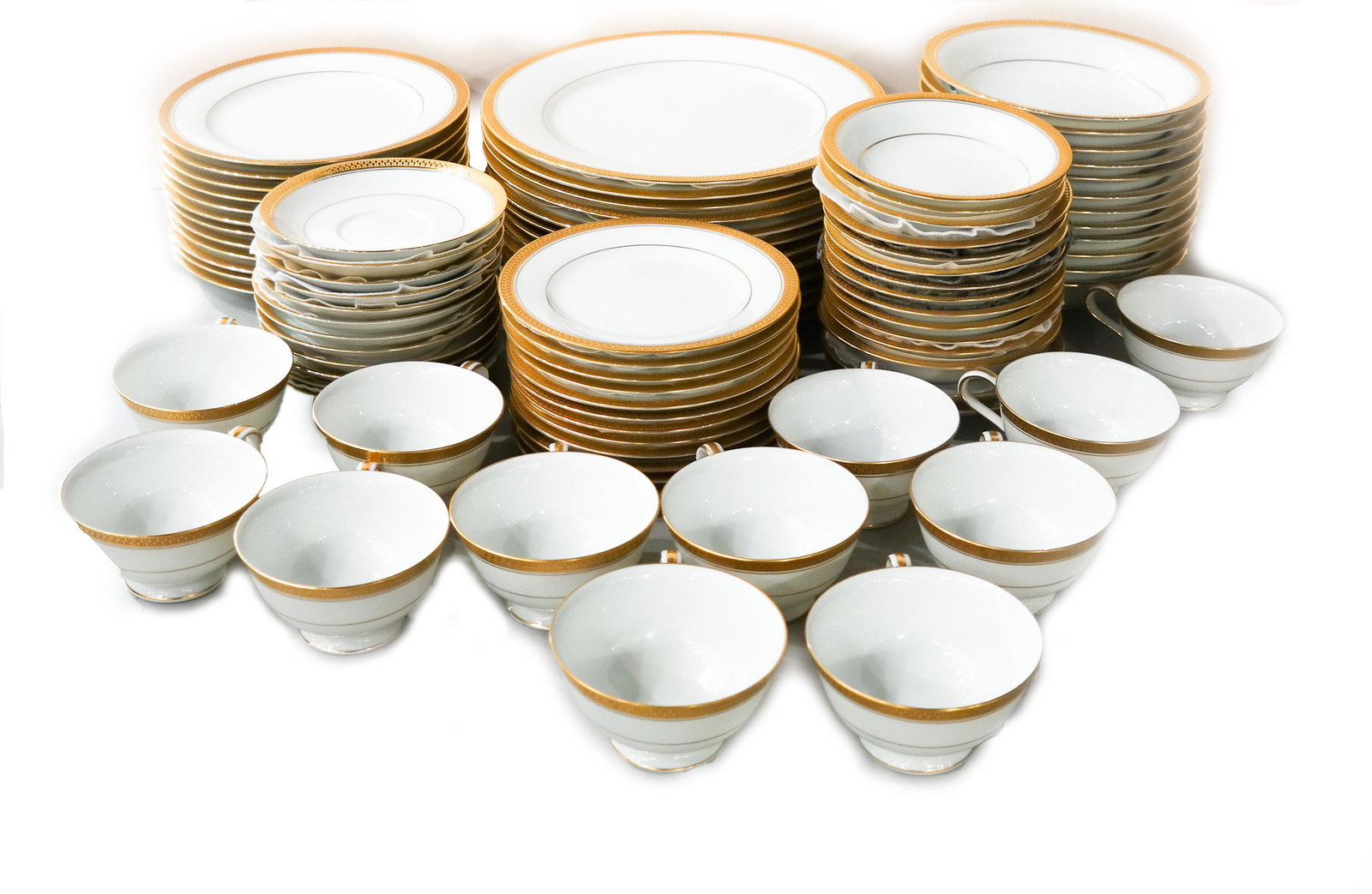 Noritake "Goldenridge" Porcelain Service for 12: Noritake "Goldenridge" porcelain dinner service comprised of 12 dinner plates (10 1/2"), 12 salad/cake plates (8 1/4"), 12 bread plates (6 1/2"), 12 soup bowls (7 3/8"), 12 cups, 12 saucers, 12 fruit 