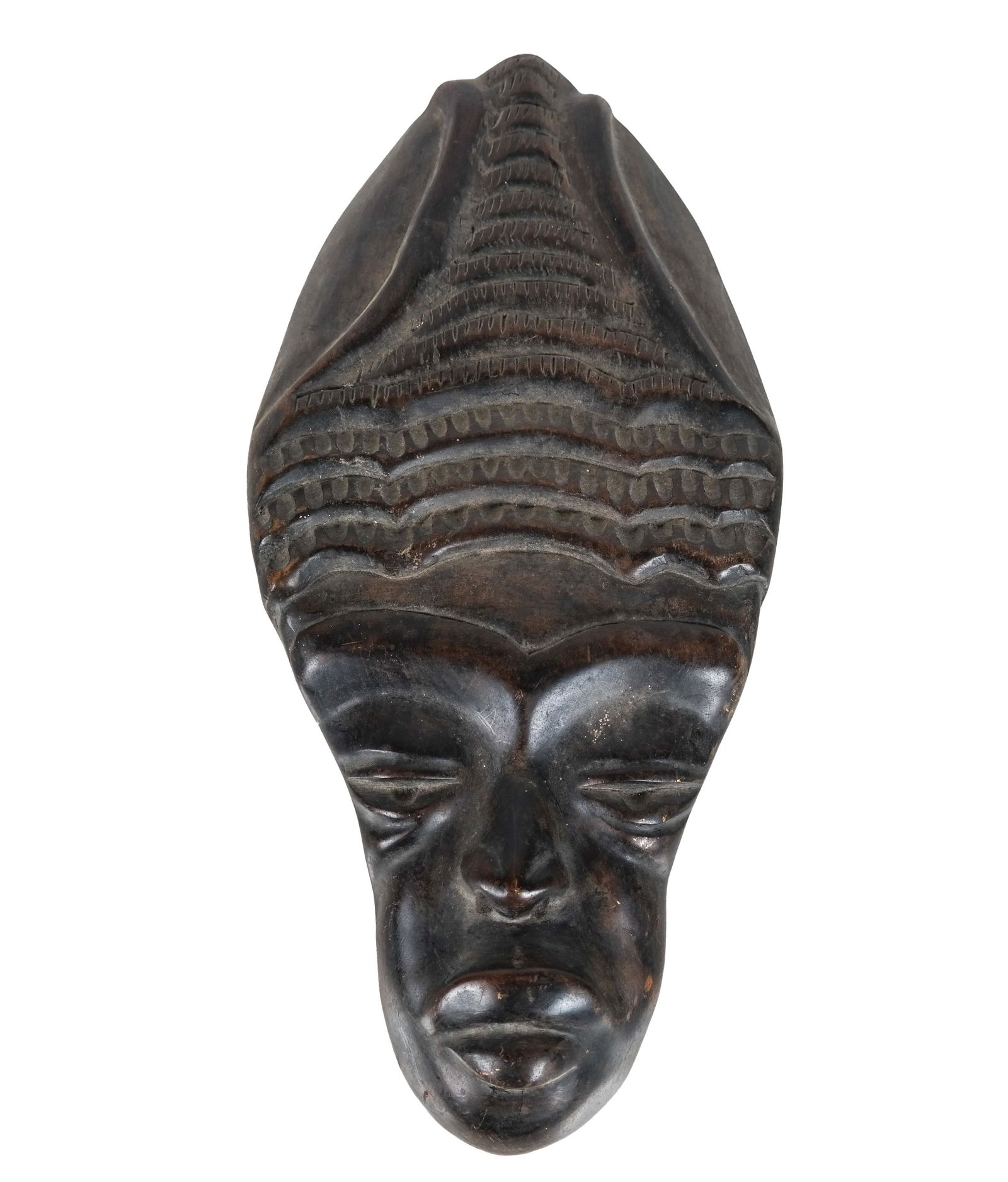 African-Style Mask: African-style carved wood mask of a woman, made in Haiti. [15 x 7 x 2 1/2 inches].
