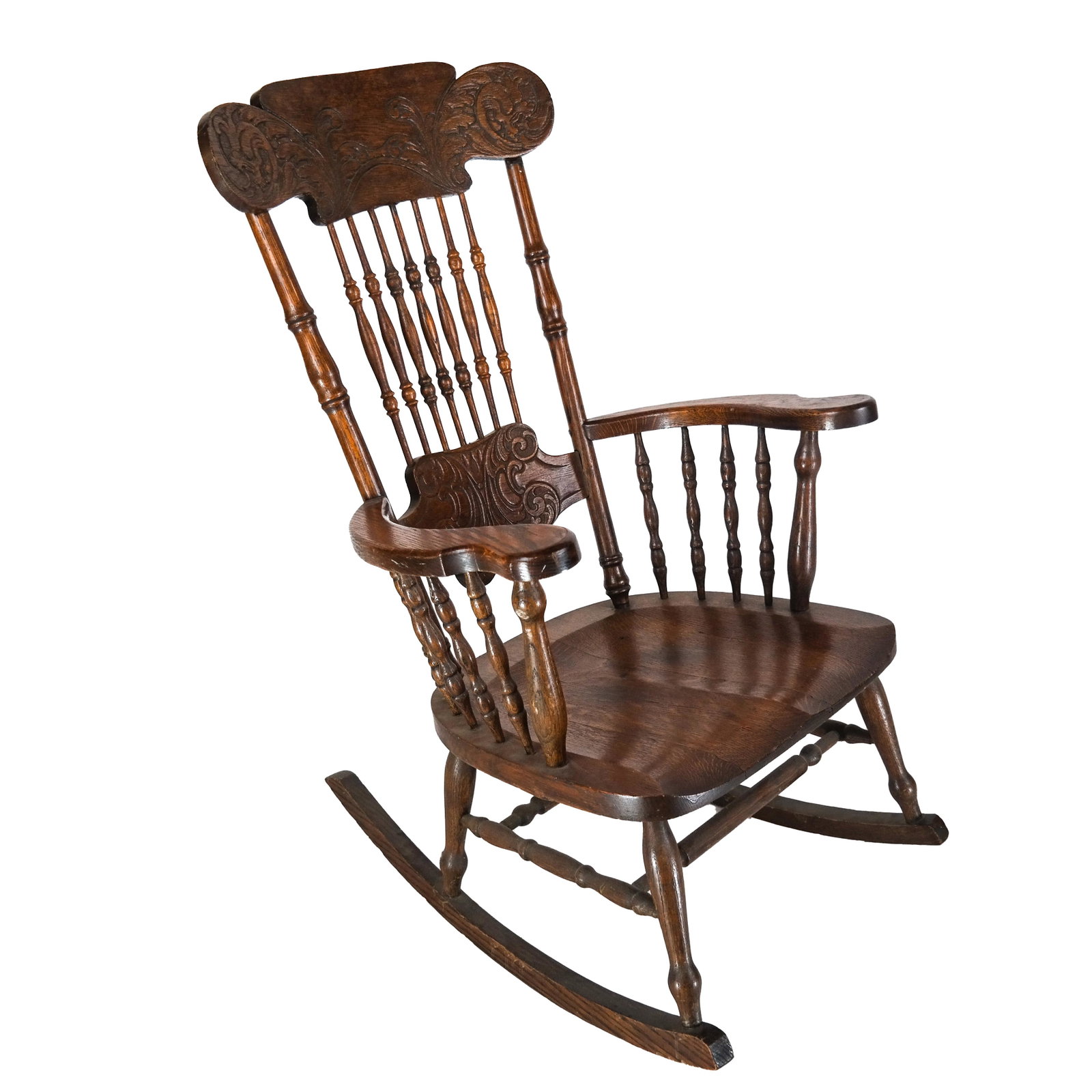 Antique Oak Rocking Chair: Incised spindle-back rocking chair.