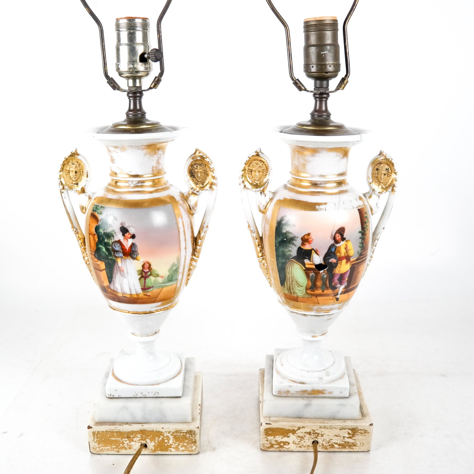 Pair of Antique Porcelain Lamps: Pair of Continental porcelain vases made into lamps. [16 x 4 1/2 x 4 1/2 inches]. One cracked and missing a piece (see photos)