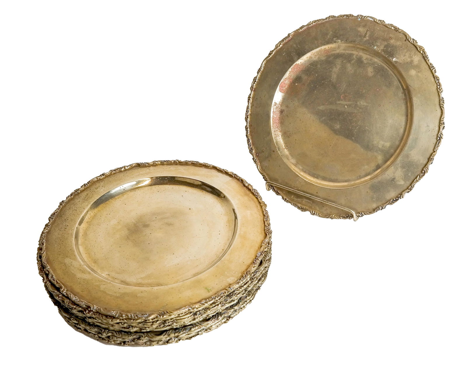 12 Alpaca, Mexican Silver Plate Chargers: Set of twelve chargers. [11 1/2 (dia) inches]. Surface wear.