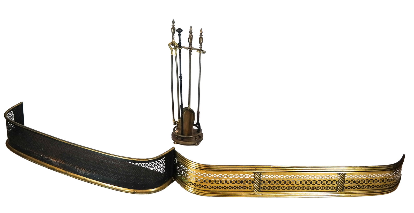 Two Fireplace Fenders & Tools: Two bronze reticulated design fireplace fenders and a set of tools with a caddy. [8 x 44 x 10 1/2 inches; 7 1/2 x 50 x 6 1/2 inches; 29 inches high].