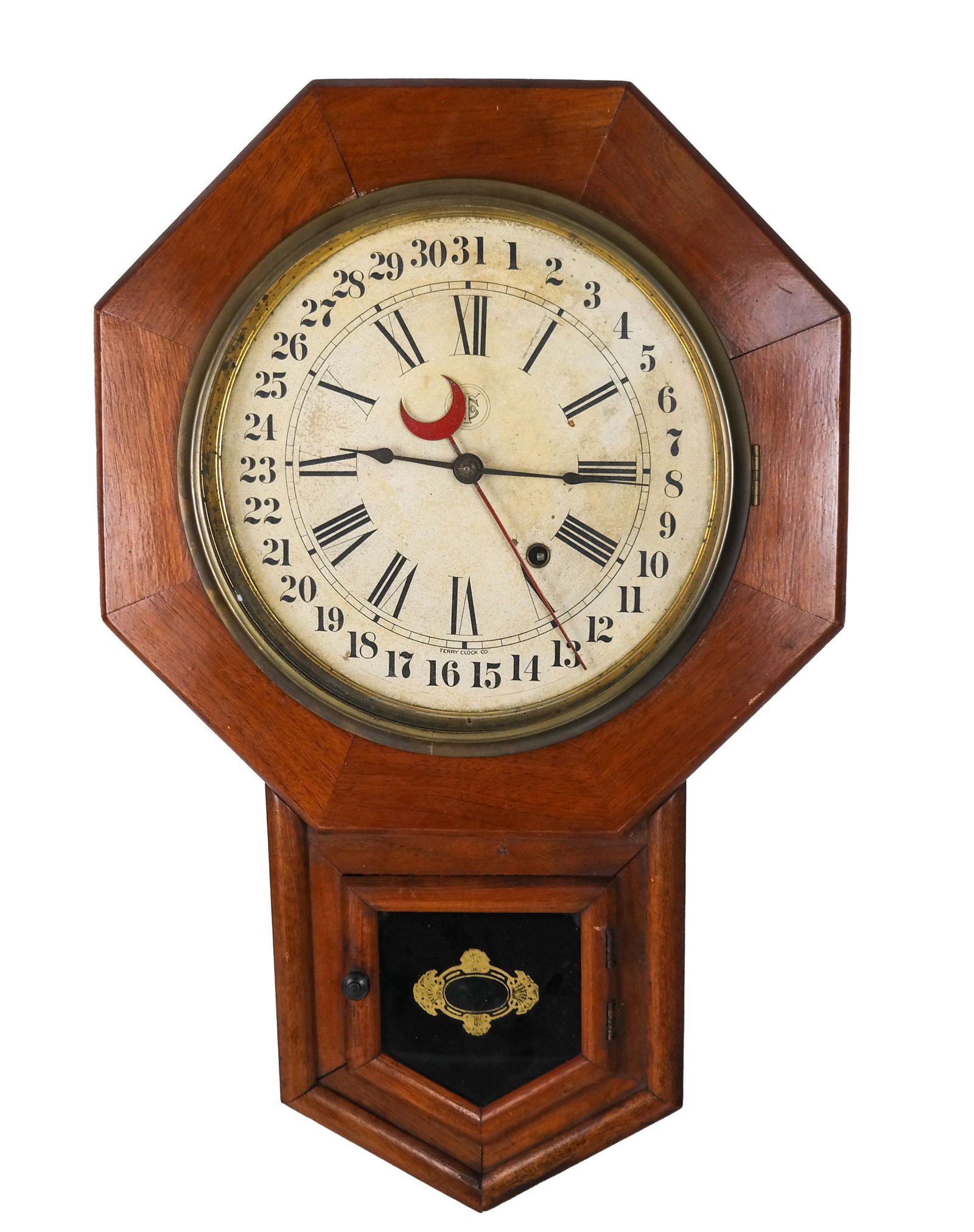 Terry Clock Co. Wall Regulator Clock: Terry Clock Co., Pittsfield, Mass., wall regulator clock. [22 3/4 x 14 1/2 x 3 1/2 inches]. Works detached; not working; in fair condition.