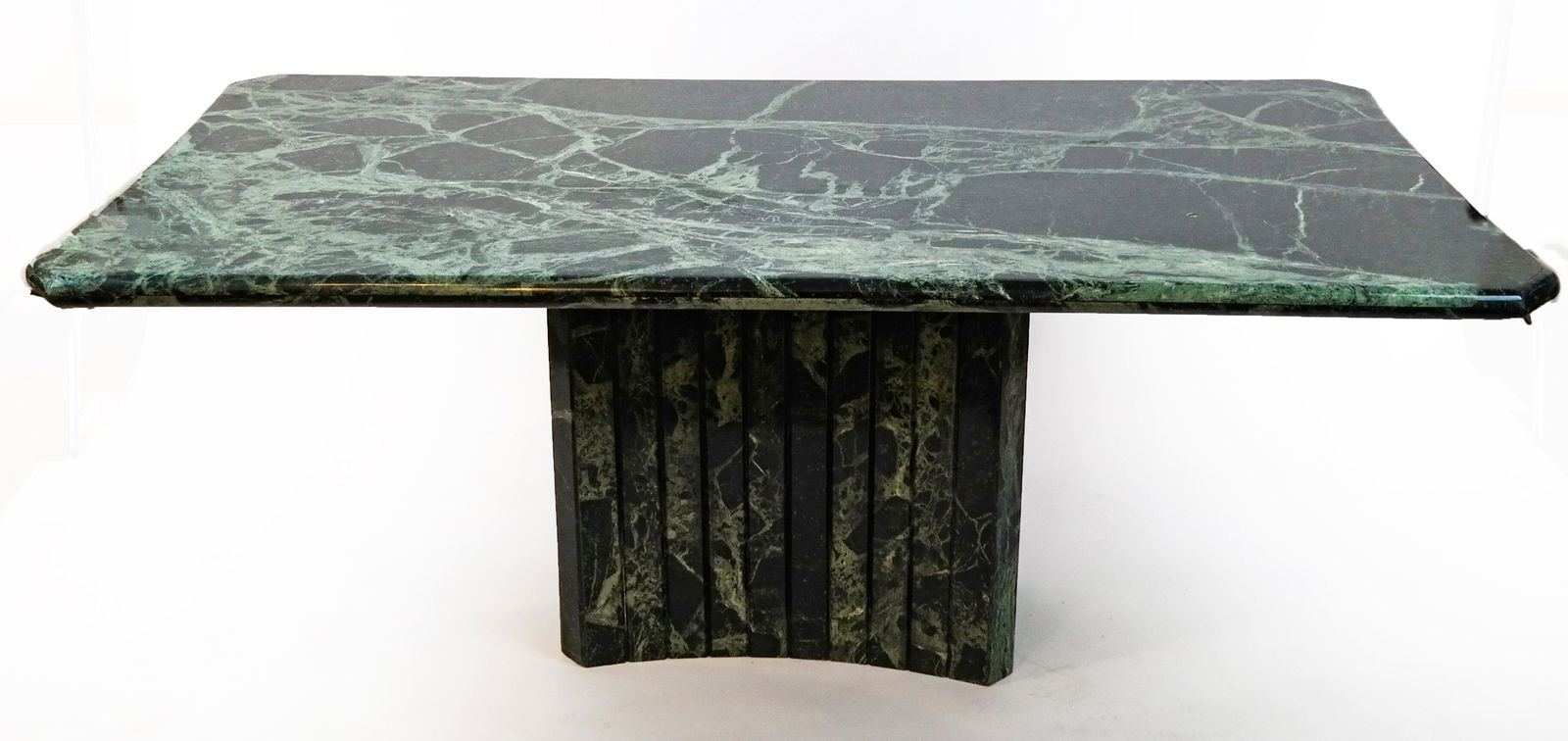 Contemporary Marble Top Table by Pace: High polished verdigris marble rectangular conference/dining table, having shaped edges, on a concave tessellated base. [30 x 73 x 37 3/4 inches]. 1/4" chip on top that can be filled and colored.