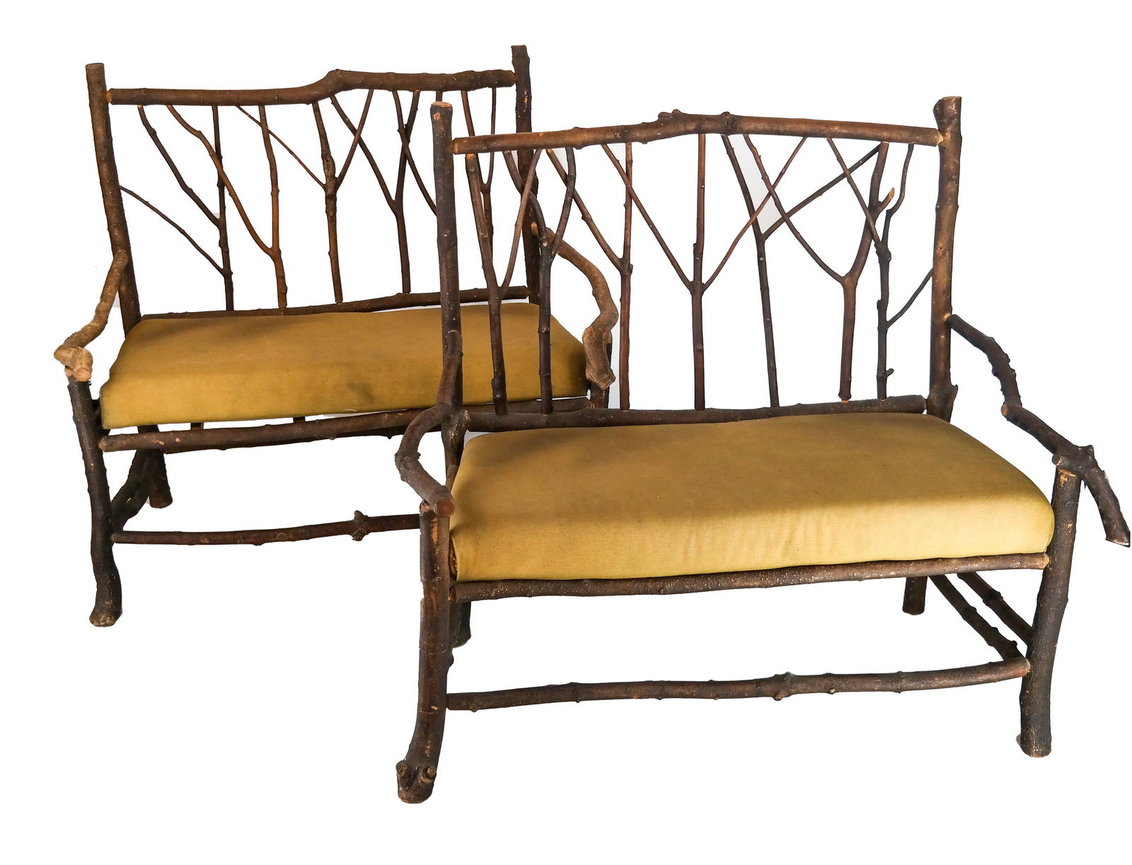 Pair Adirondack-Style Settees: Pair of tree-form settees. Provenance: From the Southampton Fresh Air Home. [45 1/2 x 48 x 26 inches]. One arm needs repair.