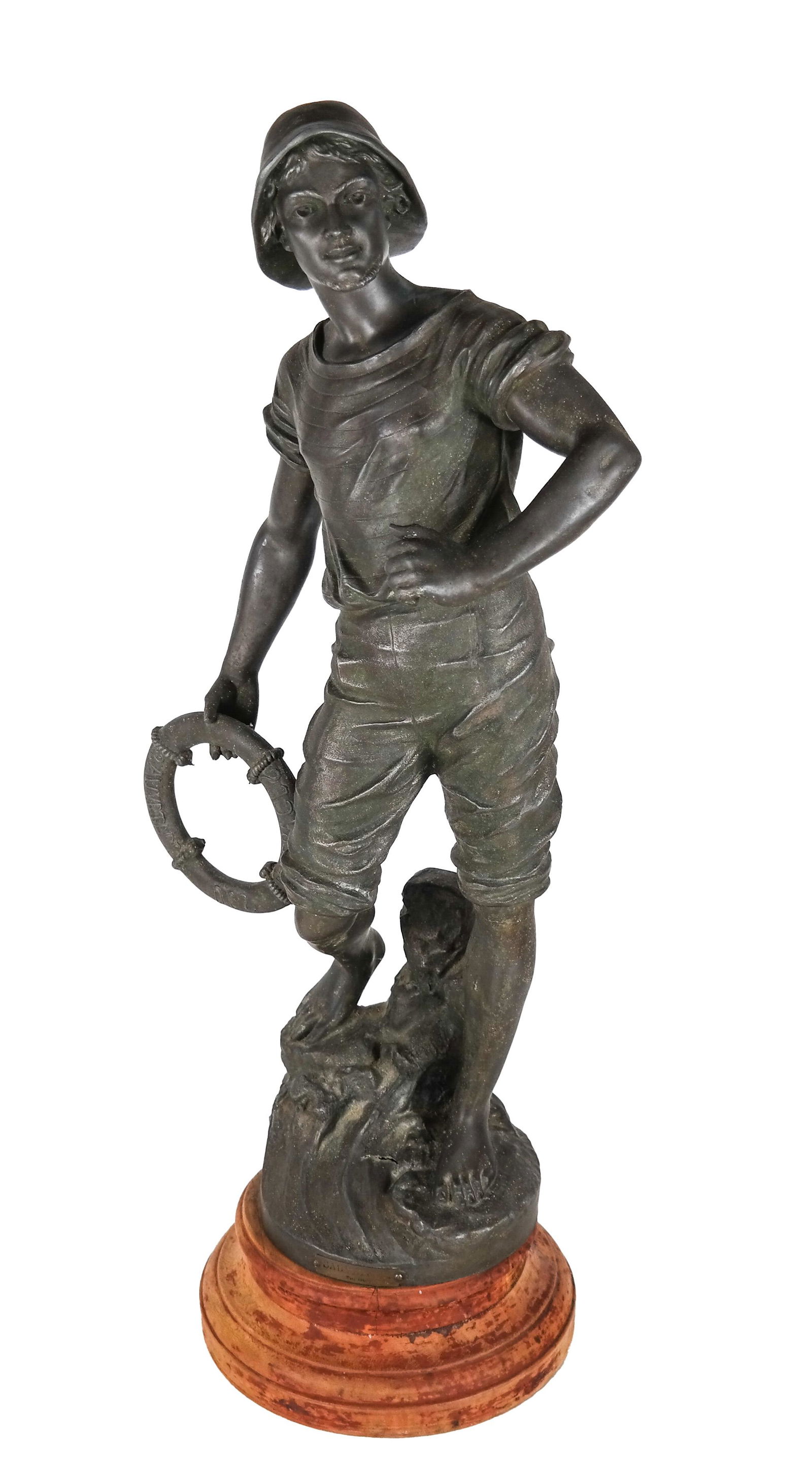 Spelter Fisherman - "Rescue of the Shipwrecked": Antique French cast bronzed spelter (zinc alloy) fisherman, circa 1900, on a turned wood circular base. The fisherman, clothedin 19th century fishing clothes, is standing upon a rocky platform looking