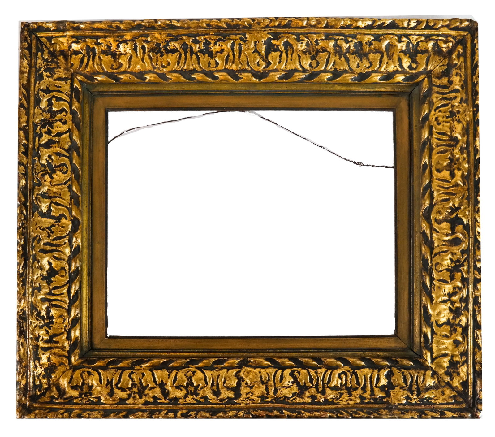 Ornate Gilt Frame: Ornate gilt frame, possibly Newcomb & Macklin. [Interior: 16 x 20 inches; Frame: 26 1/2 x 31 inches].