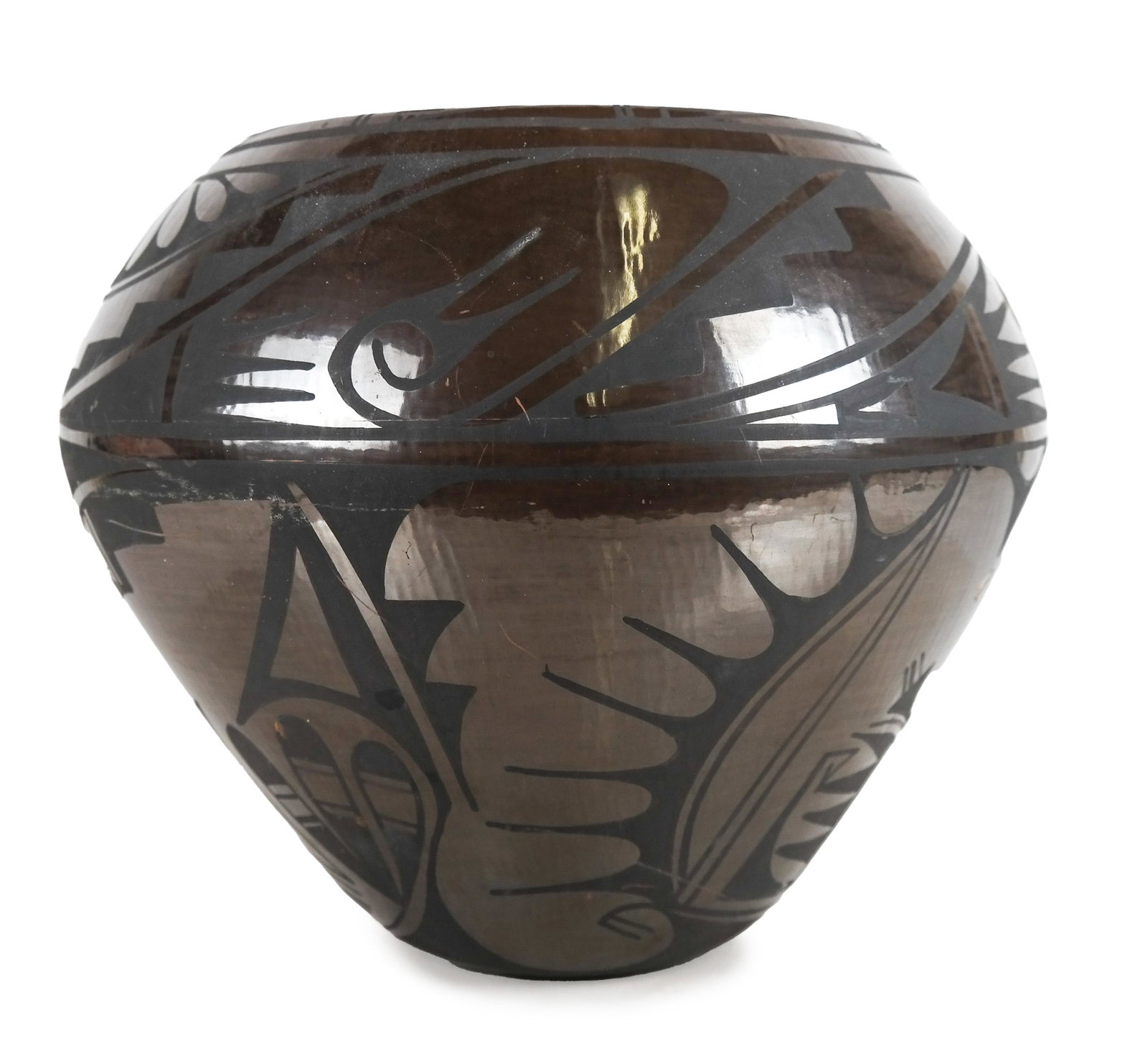 Carmelita Dunlap Sunrise Bowl: Large sunrise brown bowl by the niece and protege of Maria Martinez (potter), Pueblo. Signed. [10 1/2 x 12 (dia) inches]. Chipped on glaze.