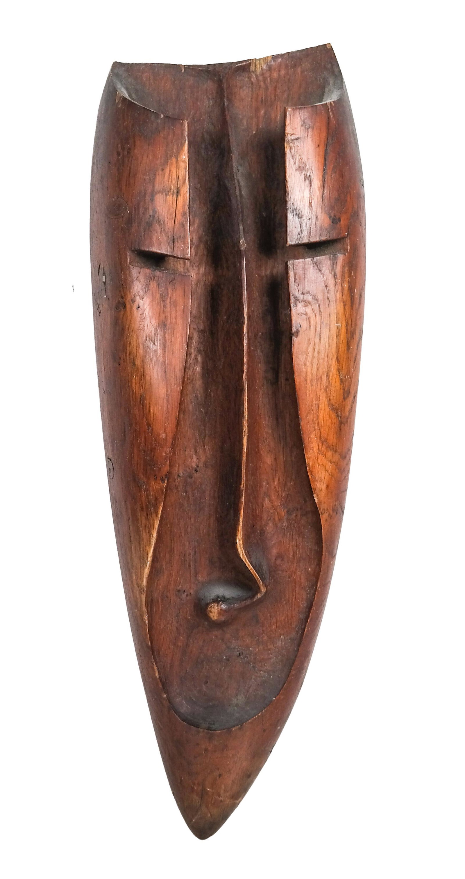 American Oak Mask Sculpture: American oak mask sculpture. [19 x 5 1/2 x 3 inches].