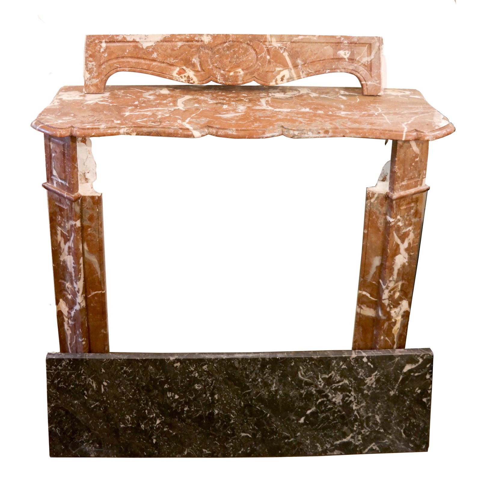 Rouge Marble Scallop-Form Fireplace: Rouge marble, scallop-form fireplace, in four sections: two sides, top and base. [40 x 43 x 14 inches; 27 inches long (inside front)]. In overall good condition.