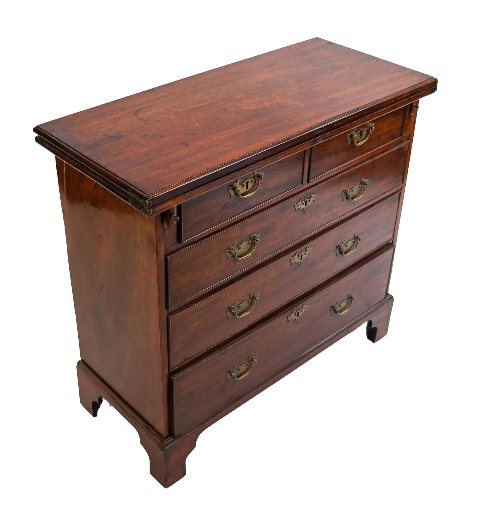 George III Mahogany Bachelor's Chest: George III mahogany bachelor's chest with hinged, fold-out top. [Closed: 32 x 35 x 15 1/4 inches; Open: 32 x 35 x 30 1/2 inches]. In overall good condition; pits; wear as with age.