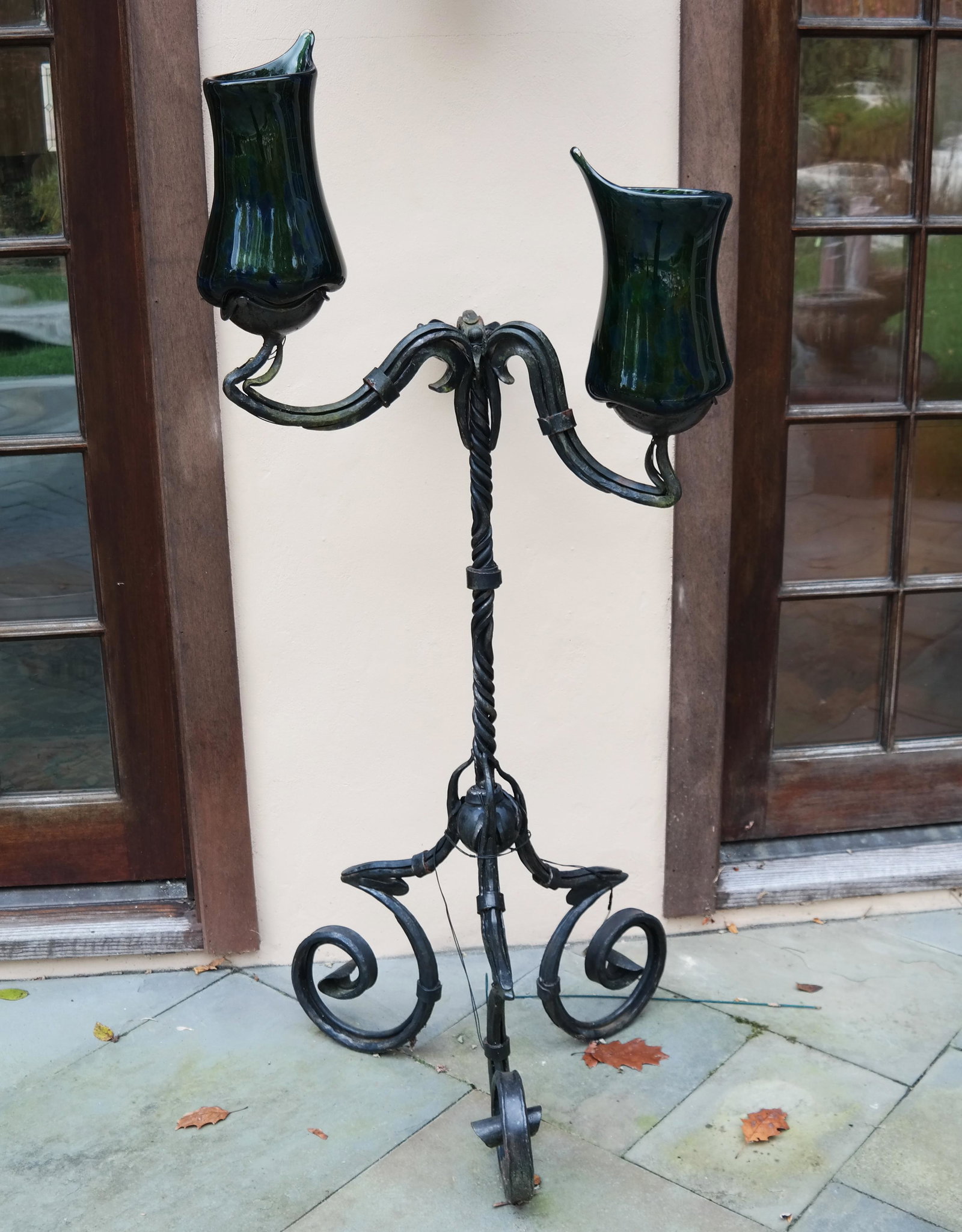 Art Nouveau Glass & Iron Torchiere: Art Nouveau iron sculptural three-light torchiere, by Greg Leavitt, with signed art glass shades by Will Dexter. [Overall: 65 1/2 inches high;28 1/2 inches across arms; 25 inches across base]. One gla