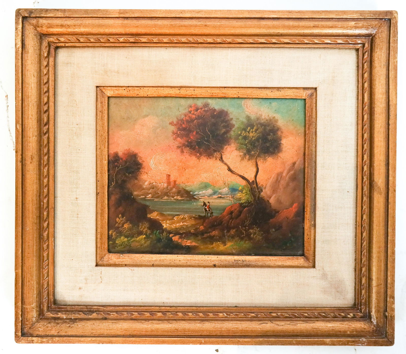 American School Figural Landscape - Oil on Masonit: Framed oil on masonite of a figural landscape. [Art: 10 x 12 inches; Fame: 15 1/2 x 17 1/2 inches]. In overall good condition.