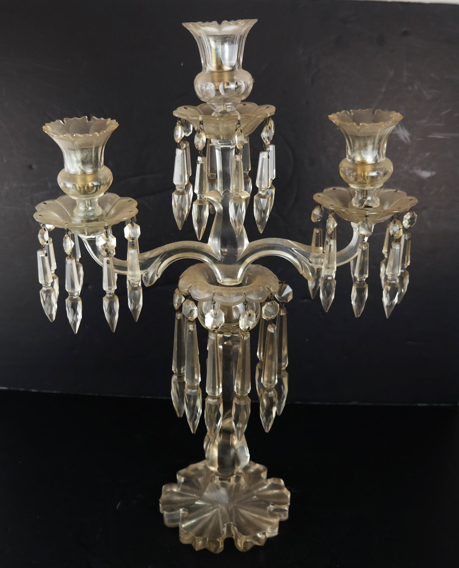 Crystal Candelabra with Prisms: Crystal candelabra with prisms. [20 1/2" H x 14" W x 5 3/4" D]. In good condition.