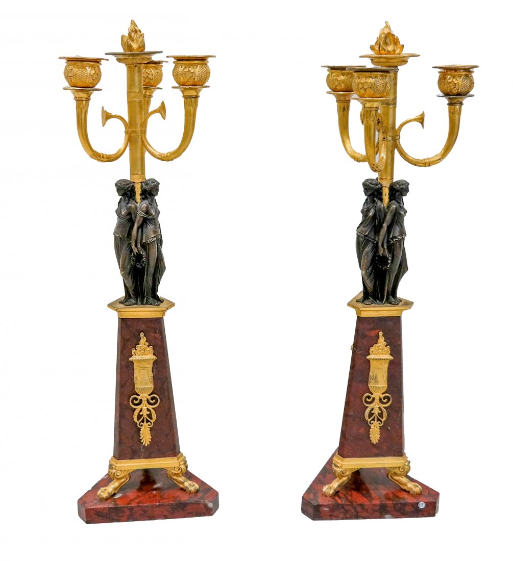 Pair of Empire Figural Candelabra: Pair of Empire figural candelabra, on tripartite bases. [19 x 5 1/2 x 5 1/2 inches].