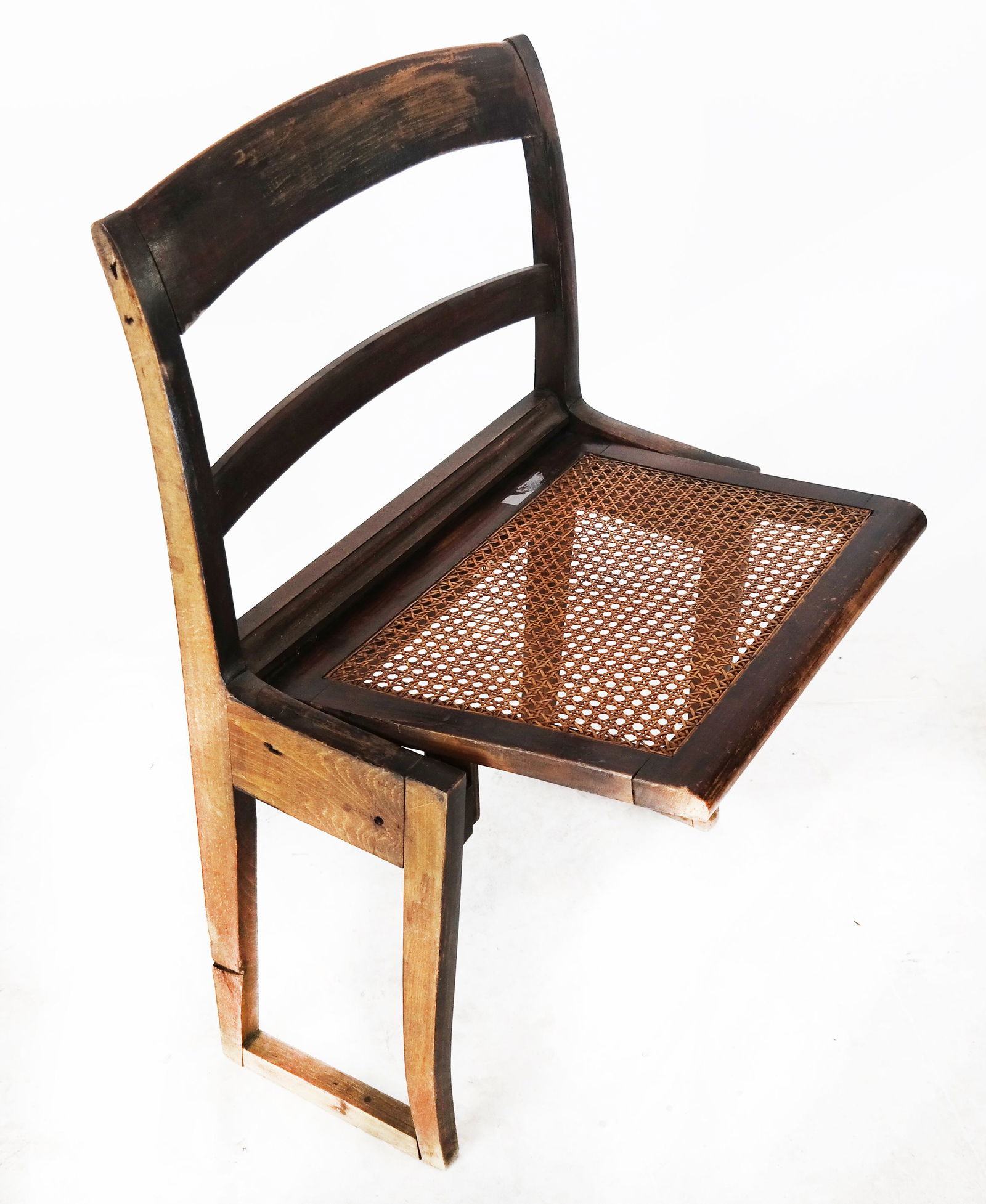 Original Opera Chair, Circa 1876: Folding opera caned seat chair from "Bayrueth Festspielhaus", #18, Anno 1876. [34 1/2" H x 22 1/2" W x 17" D; 20" to seat; Closed: 34" H x 22 1/2" W x 10" D]. In good condition.