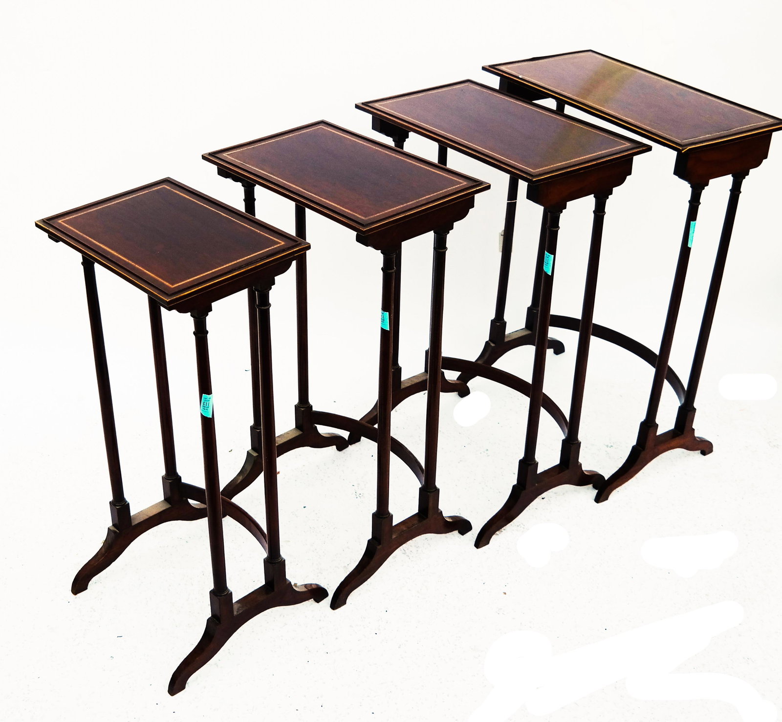 Regency-Style Nest of Four Tables: Regency-style nest of four tables. [30" H x 21" W x 12" D].