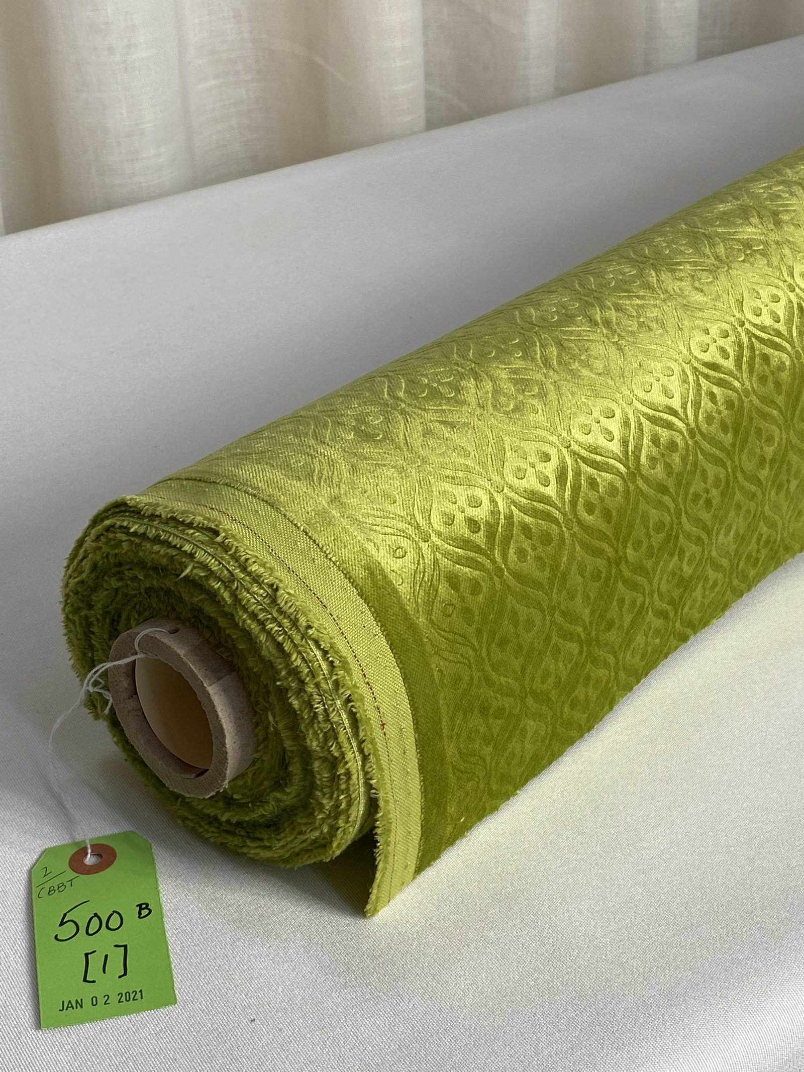 Louis XVI-Style Embossed Velvet Fabric: 16 yards (14 1/2 yards plus 1 1/2" yards of same lot) of custom lime green French gauffrage (embossed) cotton/viscose and poly velvet in a small-scale Louis XVI-style pattern, 54" wide. Excellent for 