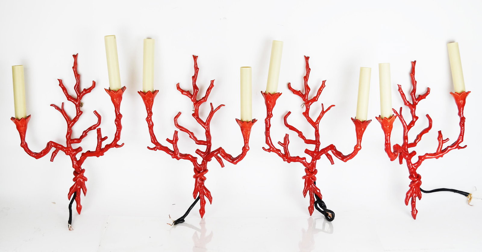 Set of Four Modern Red-Painted Metal Wall Lights: Set of four modern red-lacquered metal twin-branch wall lights. Provenance: Christie's, New York, "Living With Art" sale, lot 294. [17" H x 10 1/2" W]. In good condition.
