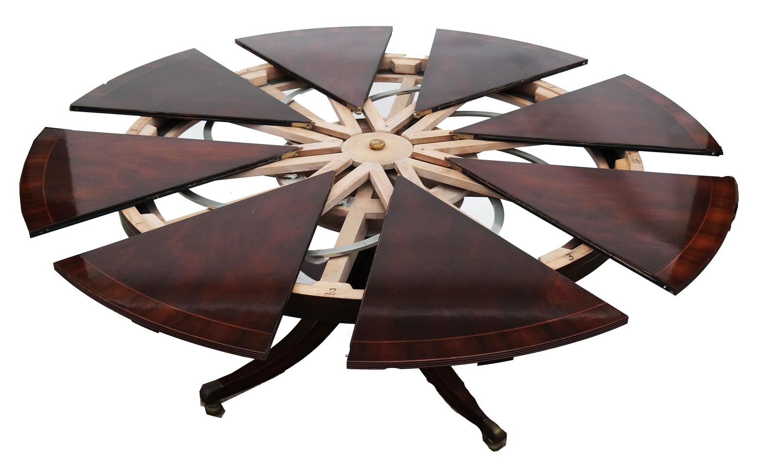 Jupe-Style Mechanical Sunburst Design Dining Table: Circular mahogany single pedestal dining room table with 8 leaves. Expandable round to round dining tables were originally invented and patented by Robert Jupe in the nineteenth century. [29 3/4" H x