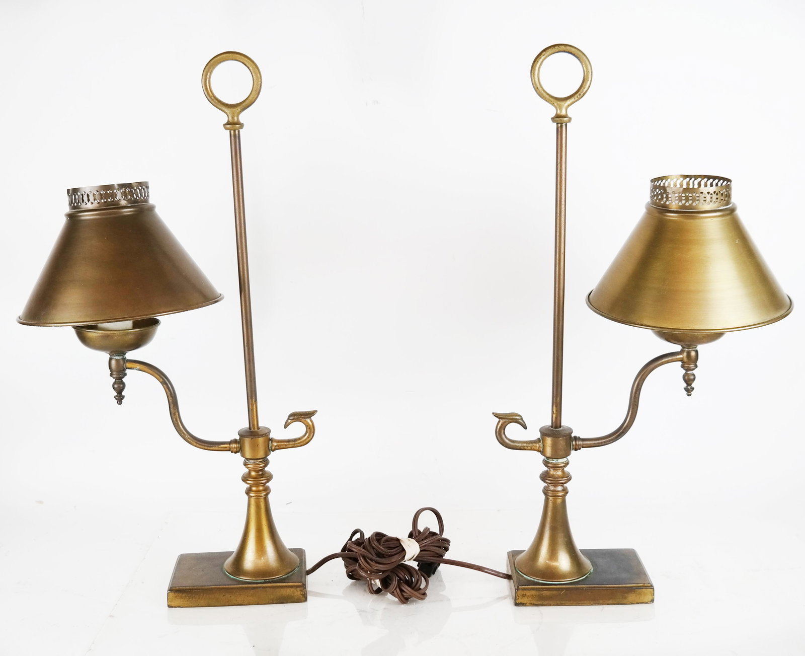 Pair of Antique Brass Lamps: Pair of antique brass lamps, with galleried brass shades and finial handles. [19" H].
