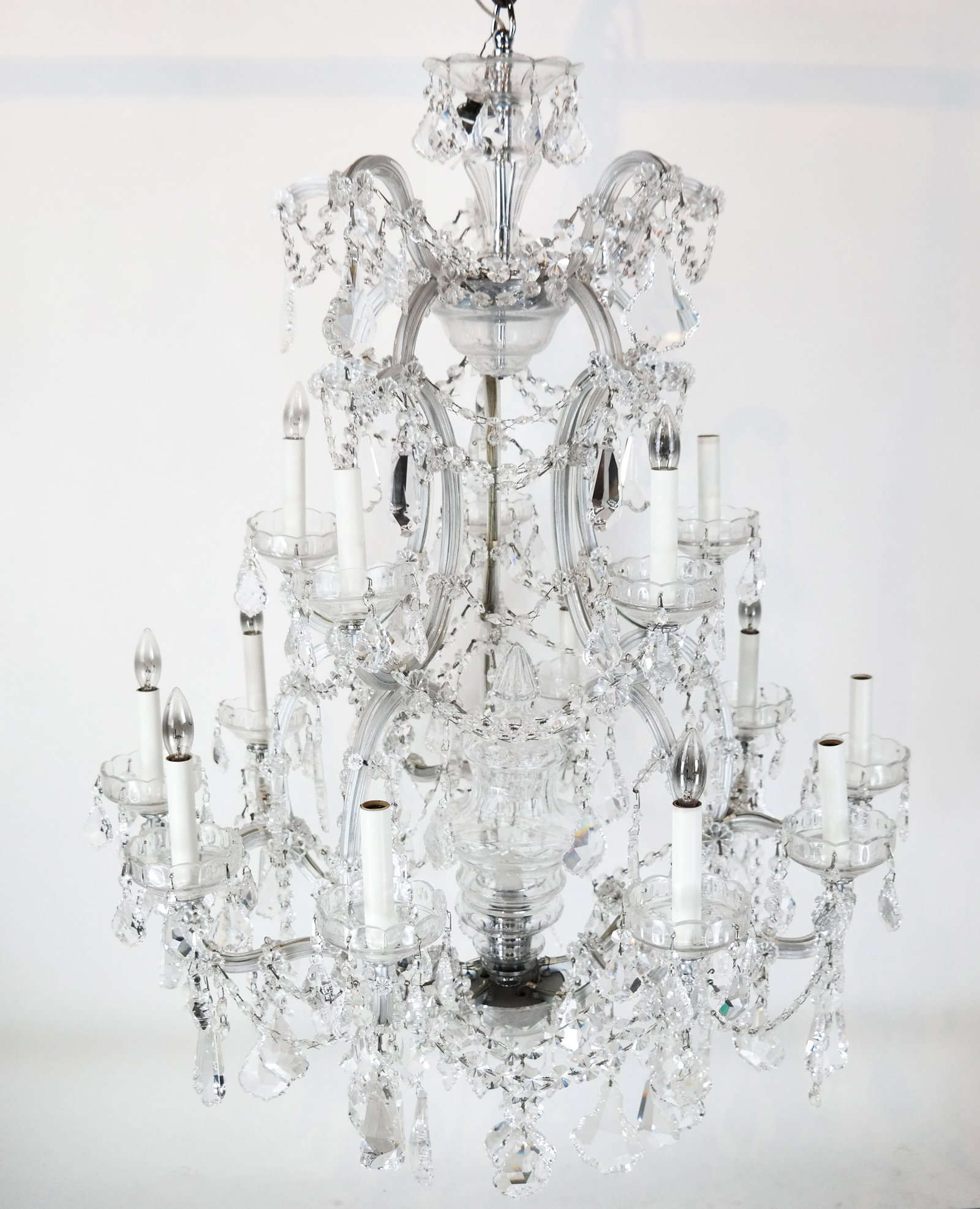 Maria Theresa Crystal Chandelier: Czech 30% lead crystal Maria Theresa 16-light chandelier. [43" H x 31 1/2" Diam.].