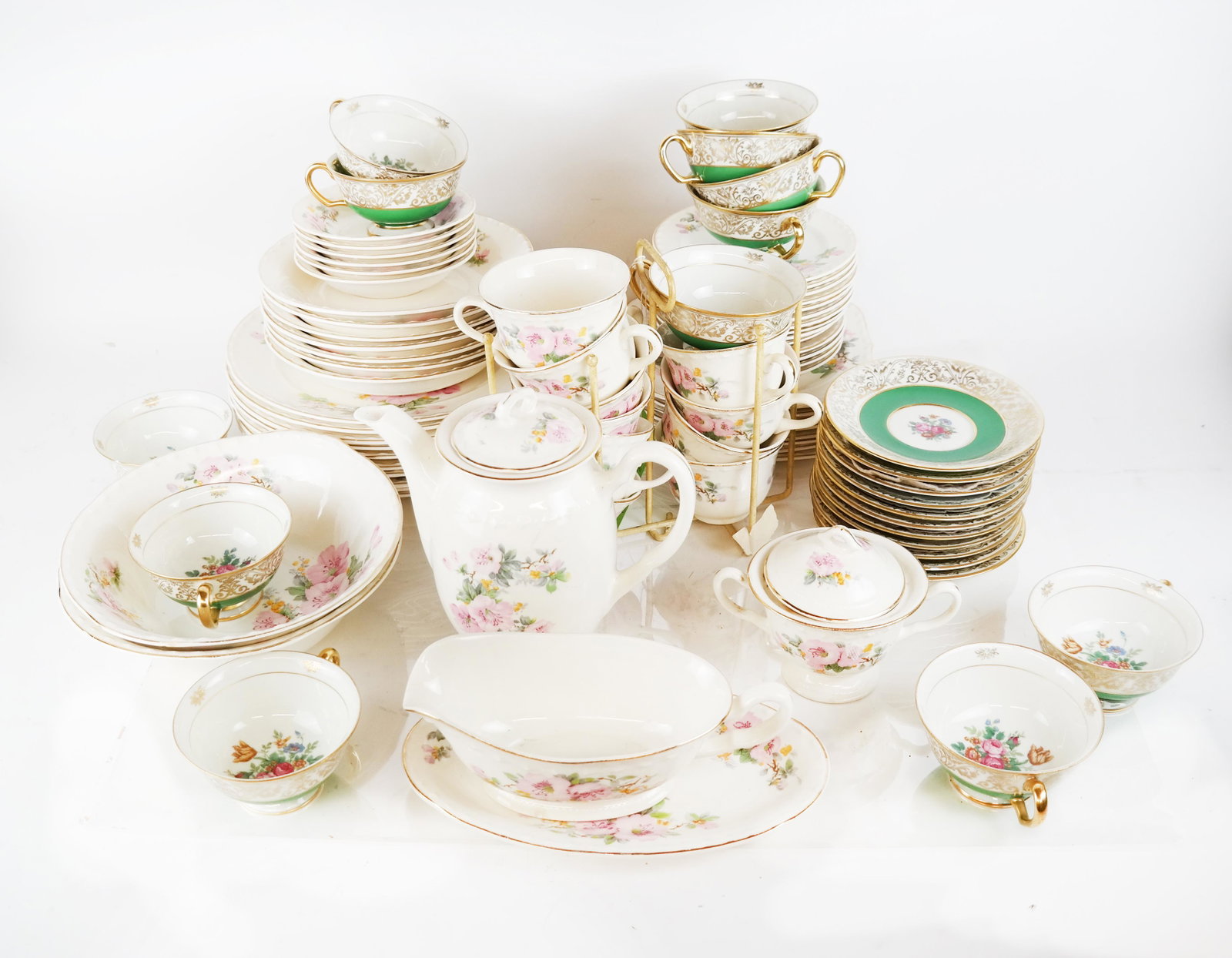 Lot of Black Knight and Crooksville Dinnerware: Lot of 62 pieces of Crooksville, U.S.A. dinnerware in "Thematie" pattern, including 10 dinner plates, 7 soup bowls, 2 veg bowls, a coffee pot, gravy boat and liner, 10 cups, 7 saucers, 6 fruit dishes,