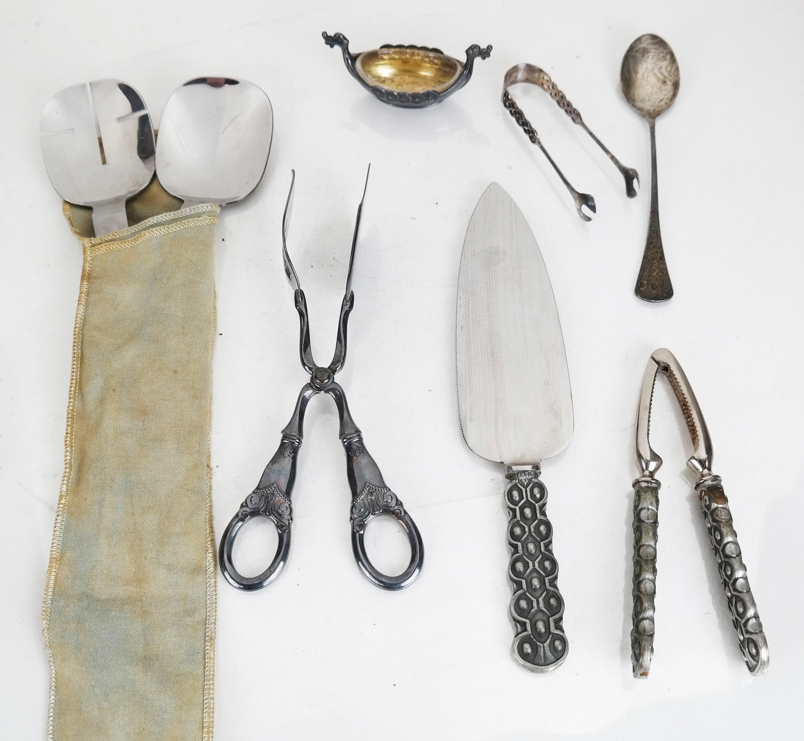 Lot of 8 Pcs. MCM Silver and Stainless Articles: Lot includes mid 20th century silver and stainless steel utensils and serving pieces. [Largest: 8 3/4" L].