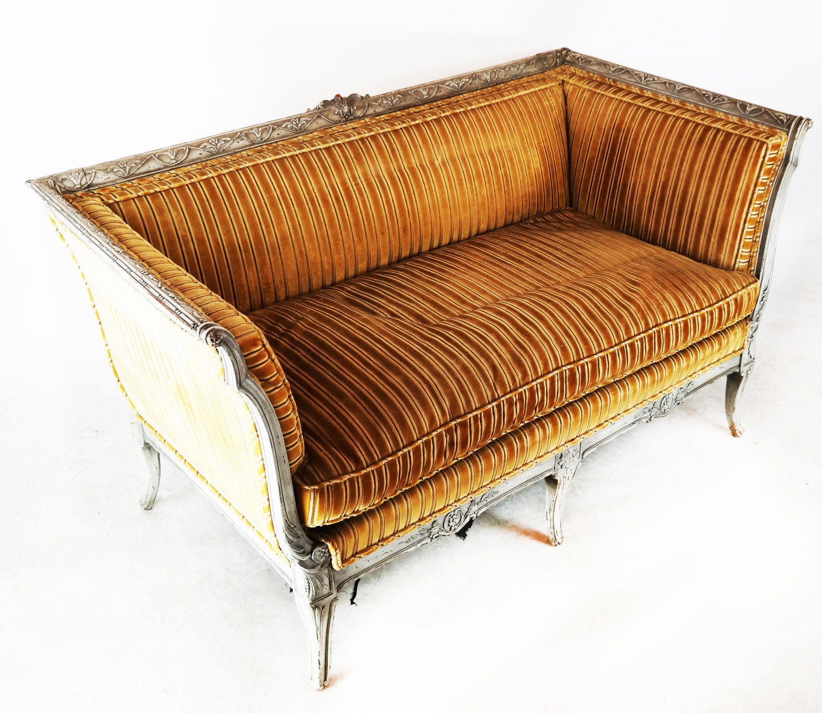 19th C. Classical Painted Settee: Antique settee, with carved relief work, having striped upholstery. [29 1/2" H x 57" W x 27" D; 17" to seat]. Upholstery as-is.