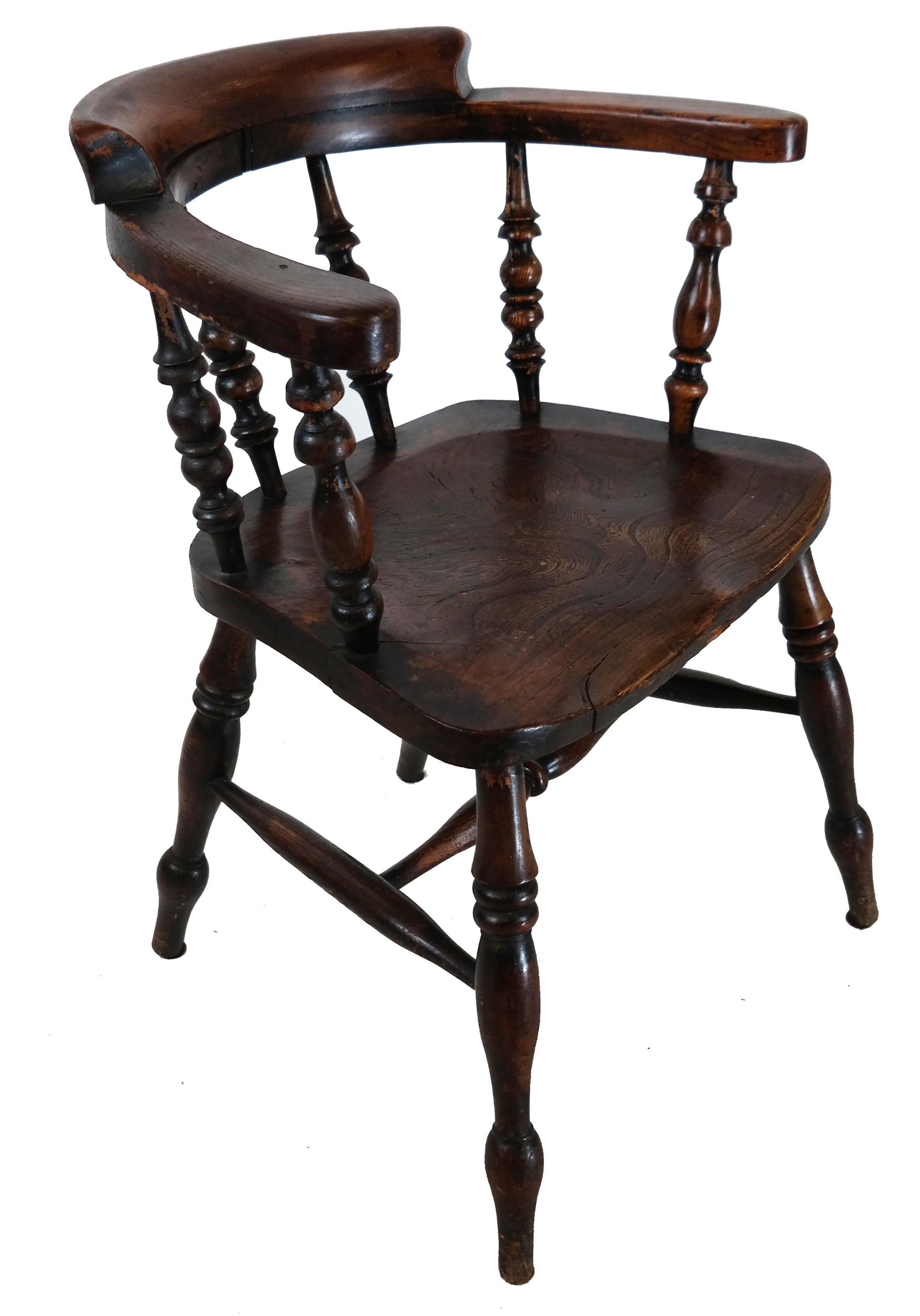 English Oak Windsor Arm Chair: Antique English oak Windsor arm chair. [27 3/4" H x 22 3/4" W x 17 1/2" D]. Splits and wear as with age; nice patina.
