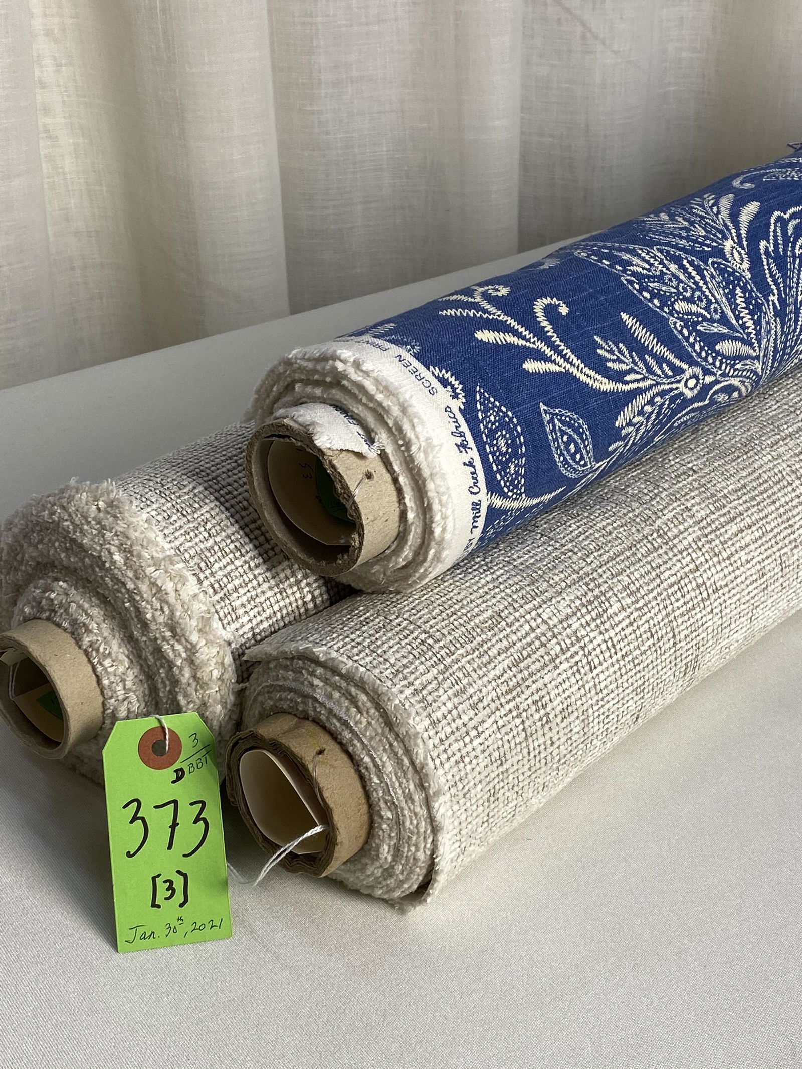 Holly Hunt and Mill Creek Fabrics: 1) 7 yards of Mill Creek's cream on blue suce printed linen of a faux embroidered floral, finished with a soil repellency. The 53" wide textile has design repeats of 13" vertical by 13 1/4" horizontal