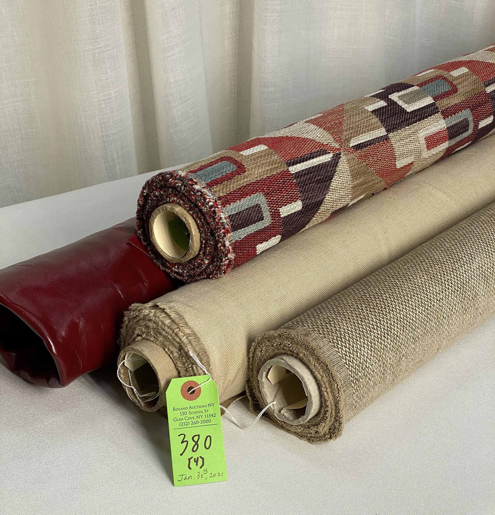 Clarence House, Kravet and Two Other Fabrics: 1) 2 3/4 yards of Clarence House's "Rio Grande", Southwestern geometric upholstery in color "Rouge", 54" wide. Design repeat of 22 1/2" vertical by 13 1/2" horizontal, in a viscose blended textile. 2)