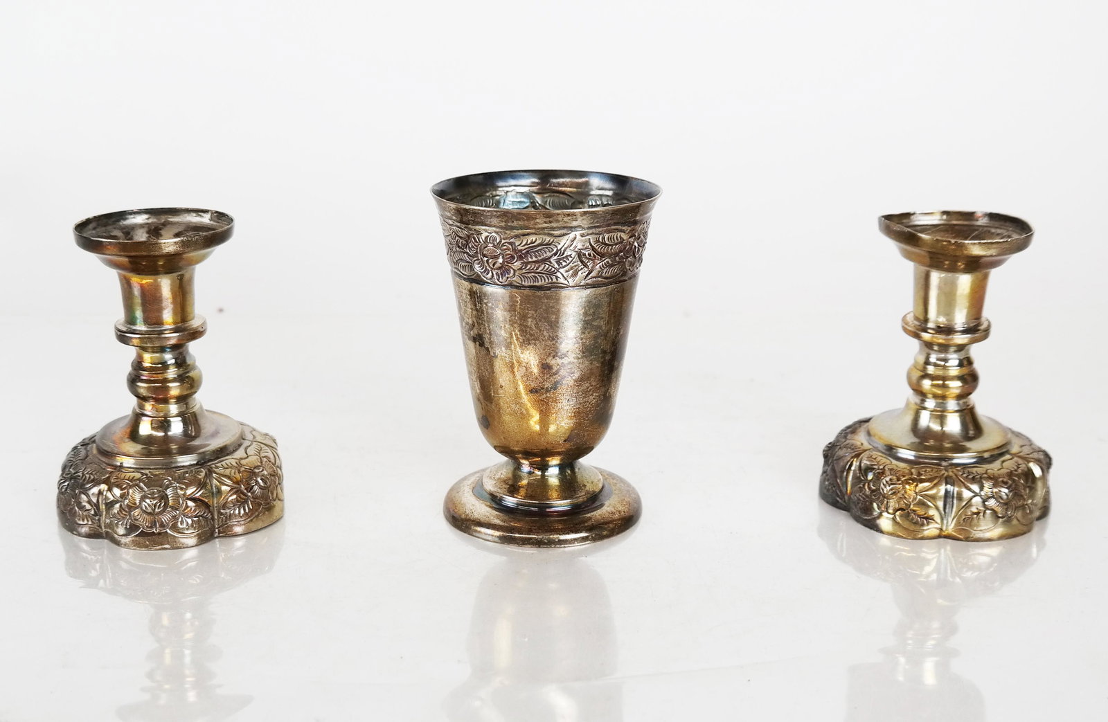 Mexican Sterling Silver Cup & Two Goblets: Mexican sterling silver wine cup and two goblets. Combined weight 12.255 ozt. [Cup: 2" H x 2 3/4" Diam.]. Dents to base of one goblet.
