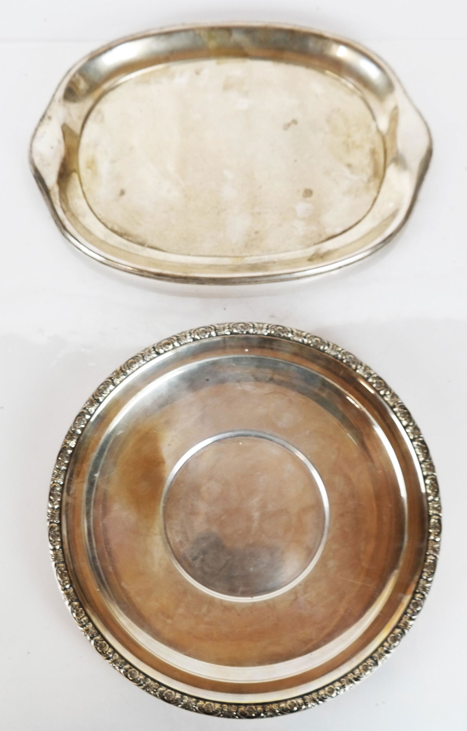 Sterling Silver Plate, Shaped Tray (2): A shaped rectangular tray [12" W x 8 3/4" D], and a round plate with chased border [10 1/2" Diam.]. Combined weight 25.35 ozt.