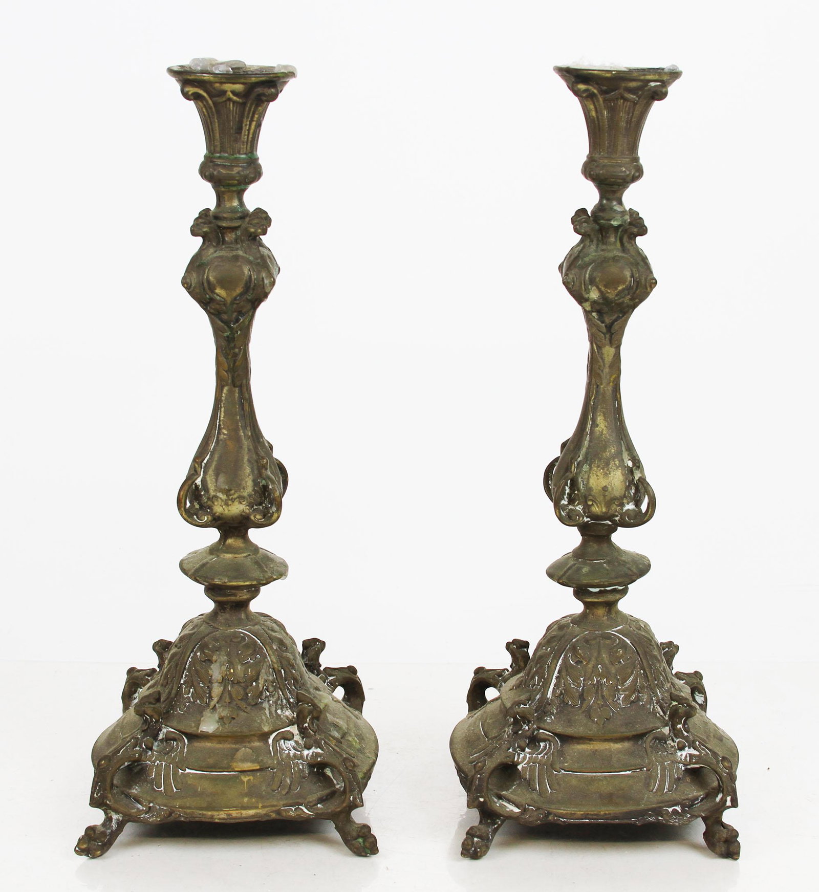 Pair Gothic-Style Pewter Candlesticks: Pair of Gothic-style pewter candlesticks. [13" H x 5" W x 5" D]. Wax residue on each.