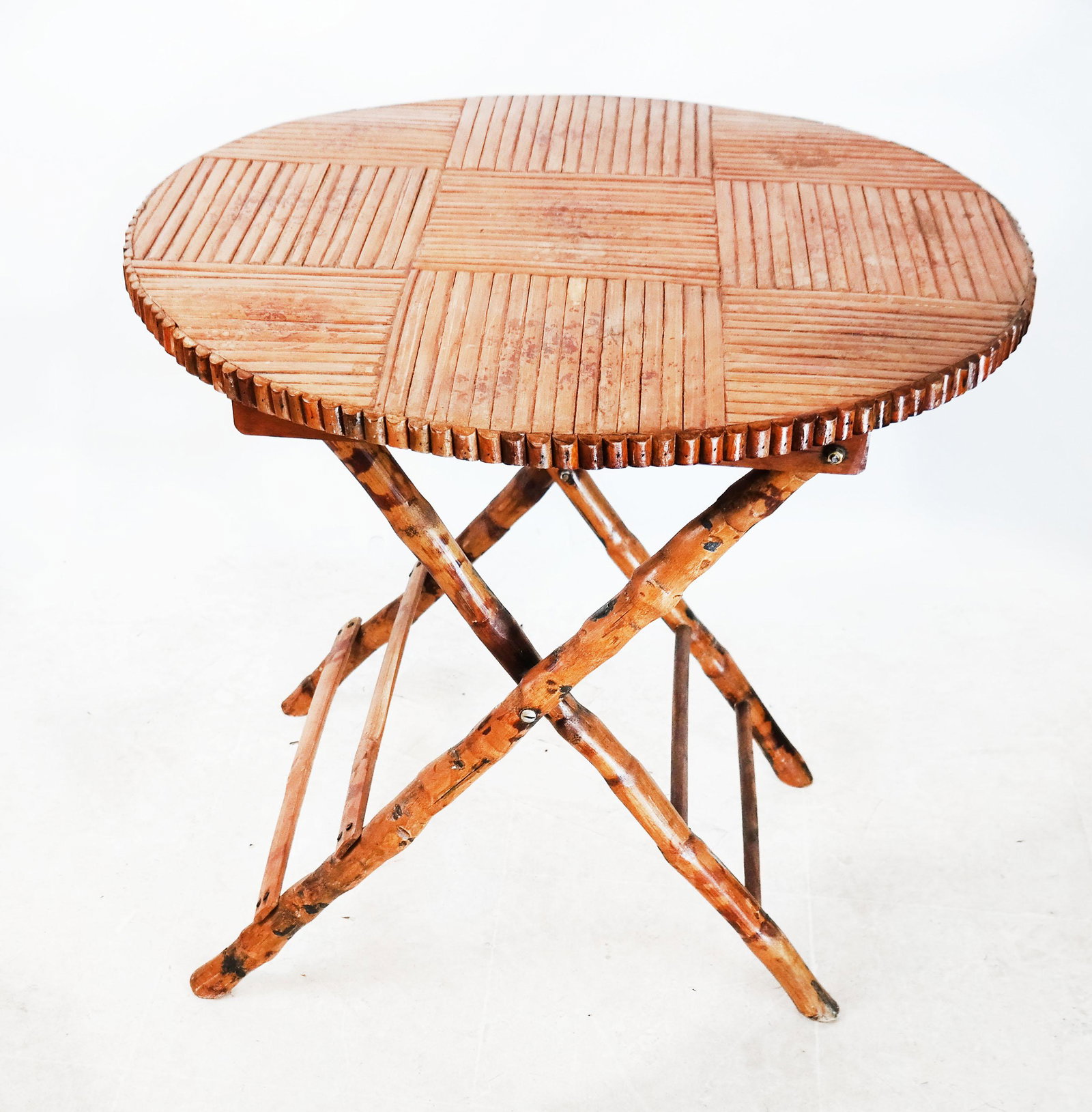 Adirondack-Style Folding Table: Adirondack-style folding table, with wood top and bamboo base. [Open: 26 1/2" H x 24" Diam.; Folded: 38 1/2" H x 24" Diam.].