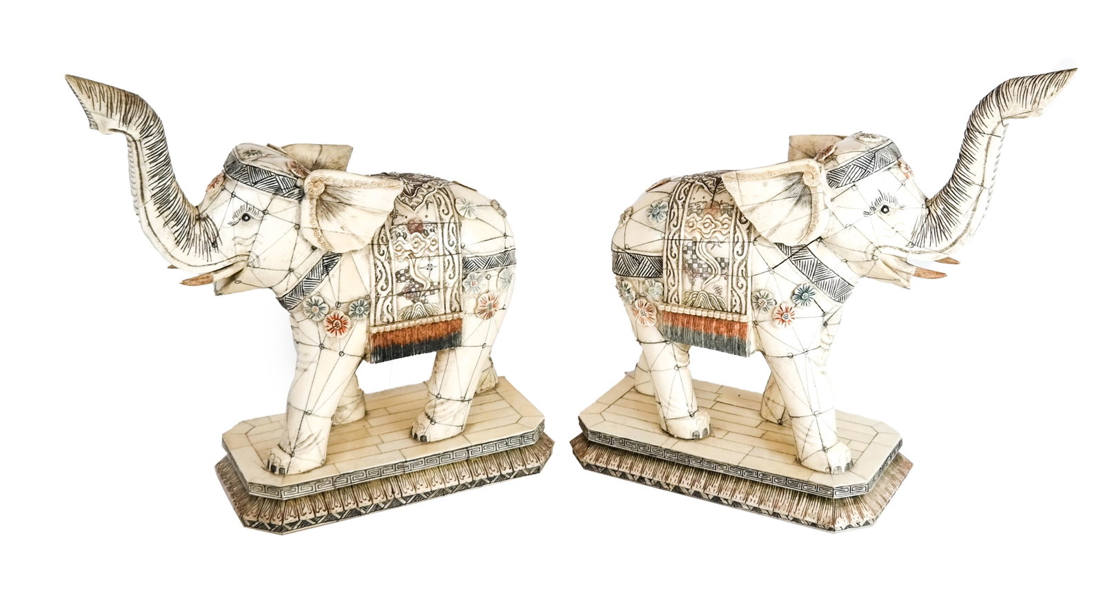 Pair Chinese Ox Bone Elephant Sculptures: Pair of Chinese ox bone elephant sculptures. [14 1/2" H x 15 1/2" W x 6" D].