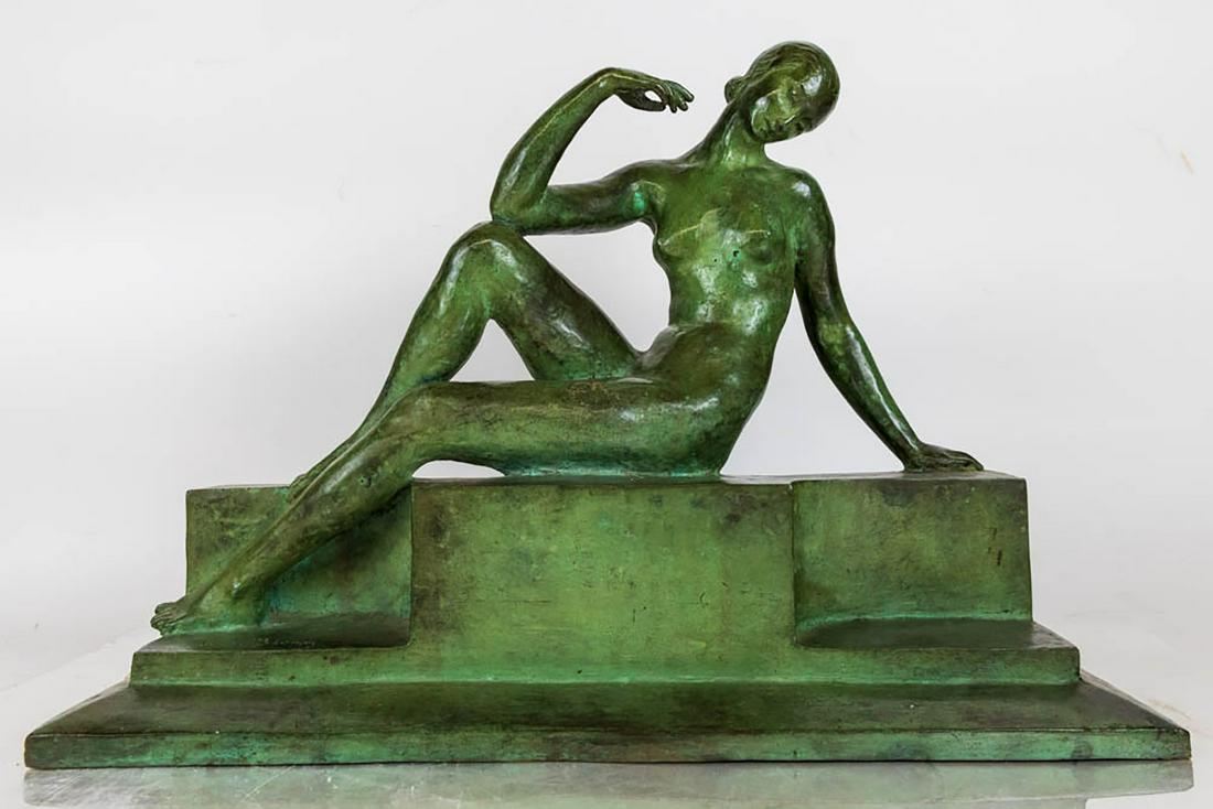 Art Deco Bronze of a Reclining Lady: Art Deco bronze sculpture of a reclining lady, by Marguerite Anne de Blonay (French, 1897-1966), circa 1930, with light green patina. [12 1/2" H x 17 1/2" W x 5" D].