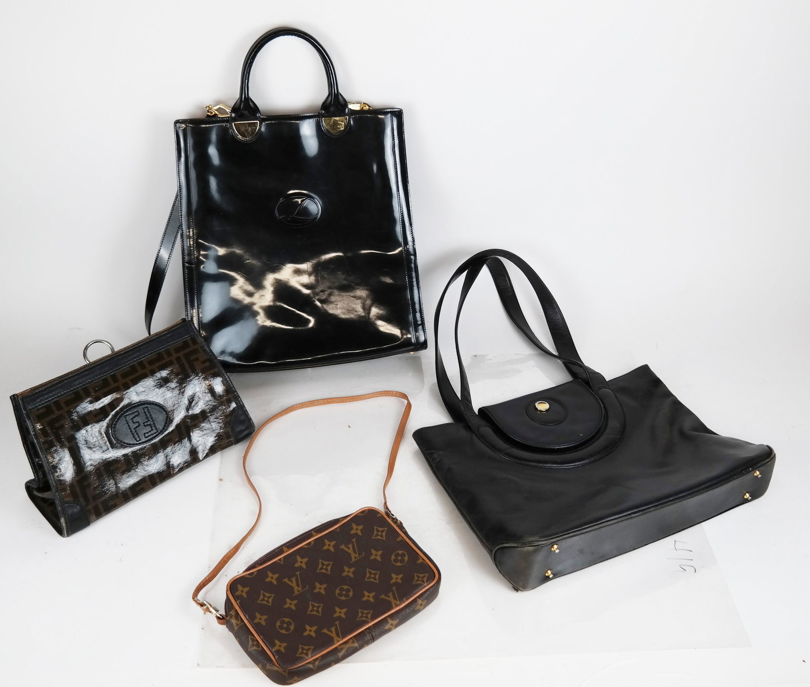 Lot of Four (4) Women's Bag: Fendi, Others: Lot of four ladies purses and handbags, one by Fendi, and others. [Largest: 14" H x 13 1/2" W x 3" D]. All with moderate to light wear.