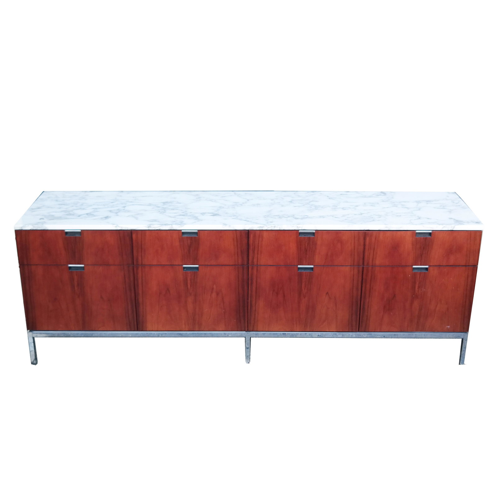 Florence Knoll Modern Credenza: 20th century modern rosewood credenza with a white marble top. From Rockefeller Center, NYC. [26" H x 75" W x 18" D].