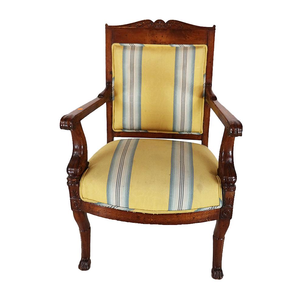 Antique French Carved Arm Chair: Antique French carved arm chair, with figural dolphin arms. [37" H x 24" W x 17" D]. Upholstery stained.