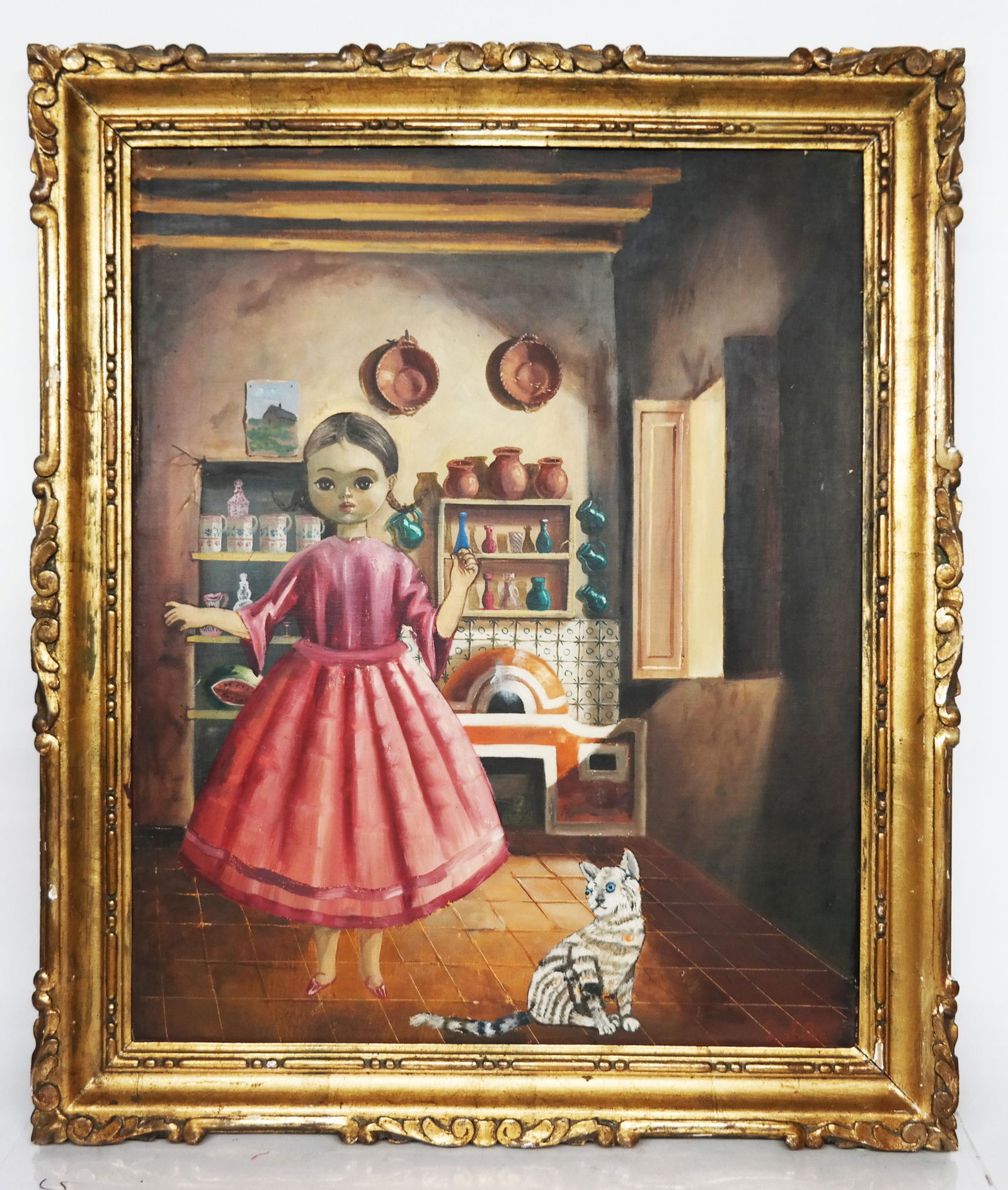 Agapito LABIOS: Girl & Cat - Painting: Agapitos Labios (Mexican, 1898-1996) oil on masonite painting of a girl and her kitten in a kitchen. [Art: 23" H x 18 3/4" W; Frame: 27" H x 23" W].