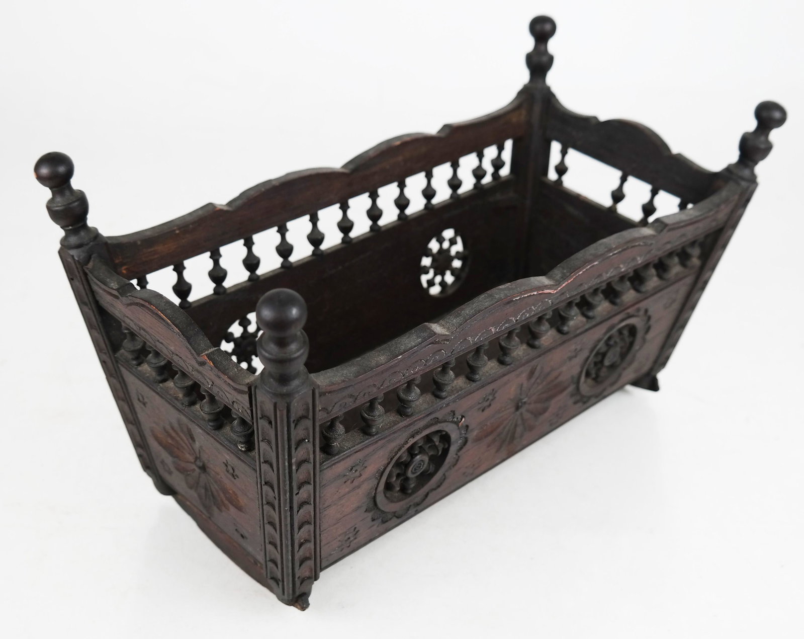 Miniature English Brittany Cradle: Miniature English Brittany cradle. Provenance: From a Locust Valley Estate. [7" H x 11" W x 5 1/4" D].