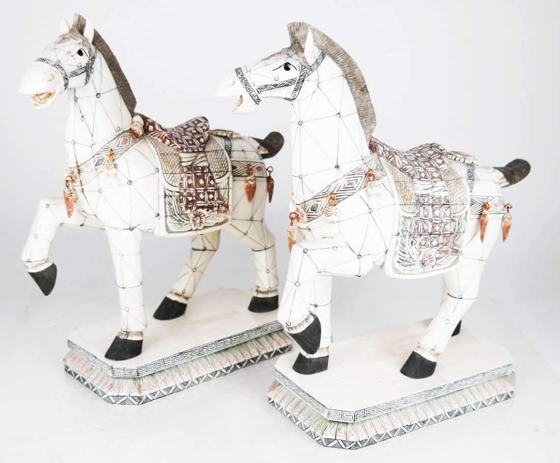 Pair Chinese Ox Bone Horses: Pair of Chinese ox bone horses. [14 1/2" H x 13" W x 5" D]. In good condition.