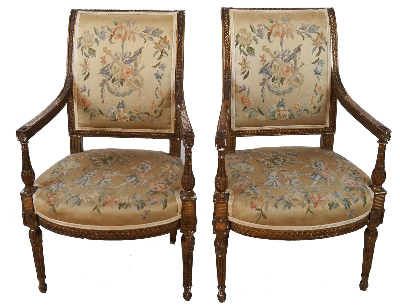 Pair of Louis XVI-Style Arm Chairs: Pair of antique Louis XVI-style arm chairs, with embroidered upholstery. [35 1/4' h x 21" W x 17" D]. Wear to frames.