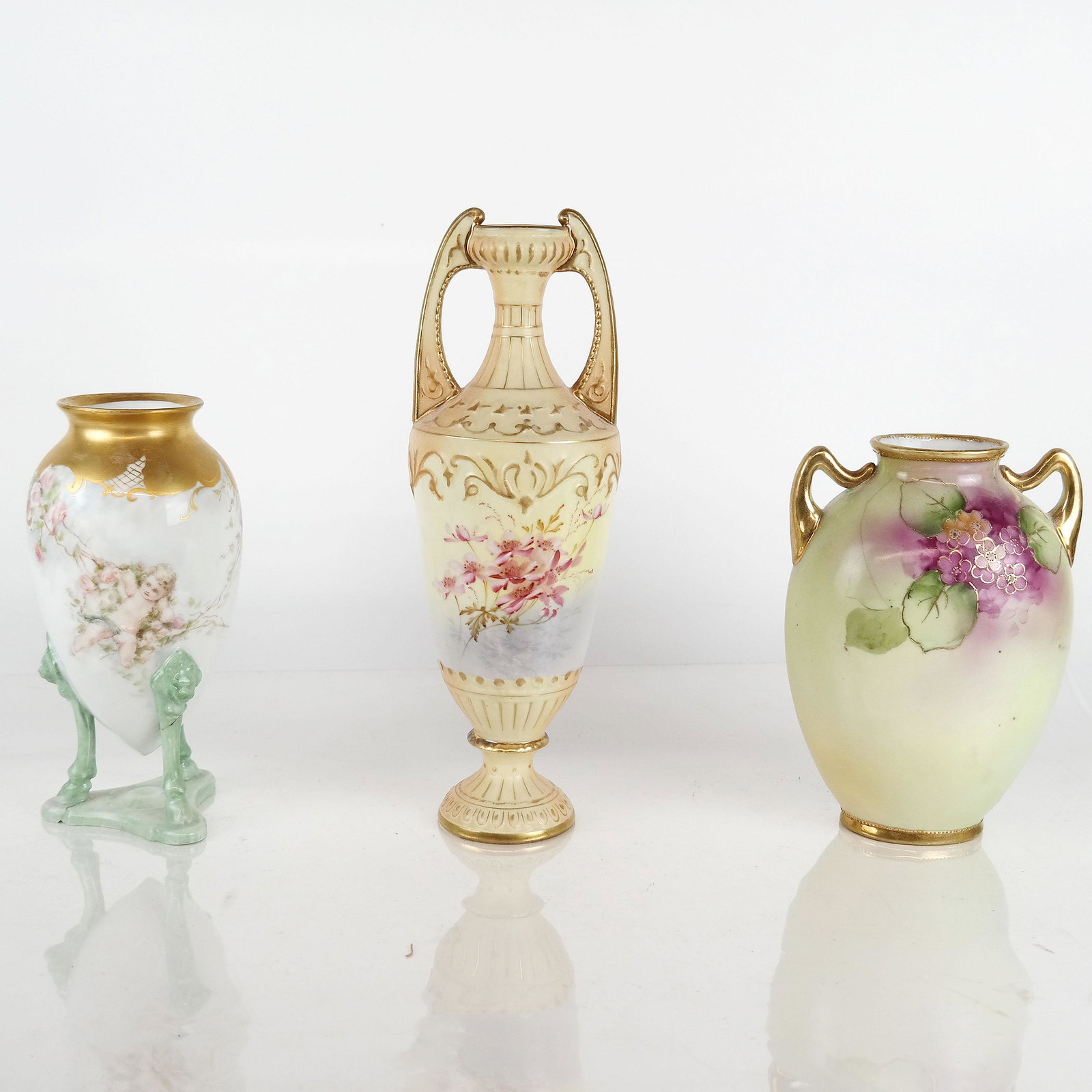 Three Gilt & Painted Porcelain Vases: Three vases, by Nippon, MTR France, and one unmarked. [Tallest: 11" H x 3 1/2" Diam.].