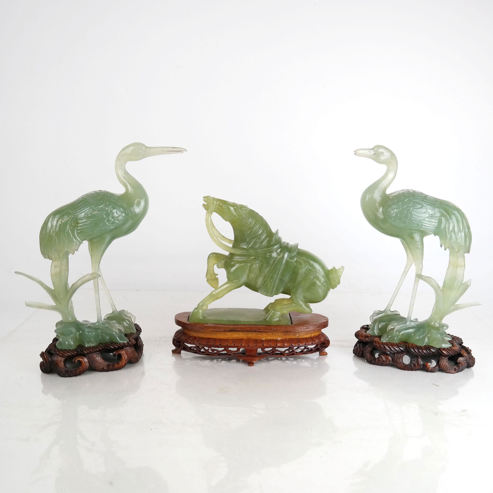 Three Carved Green Quartz Figures on Stands (1 of 20)