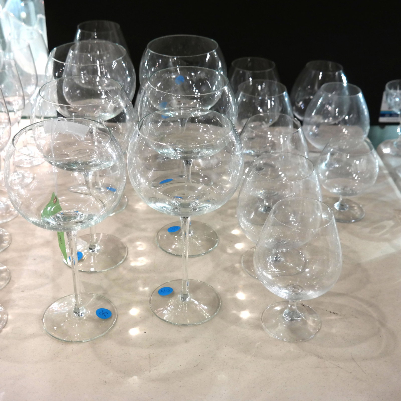18 Brandy and Wine Glasses: Lot includes 6 large wine glasses [9 1/2"H], 10 brandy snifters (two Baccarat), and others.