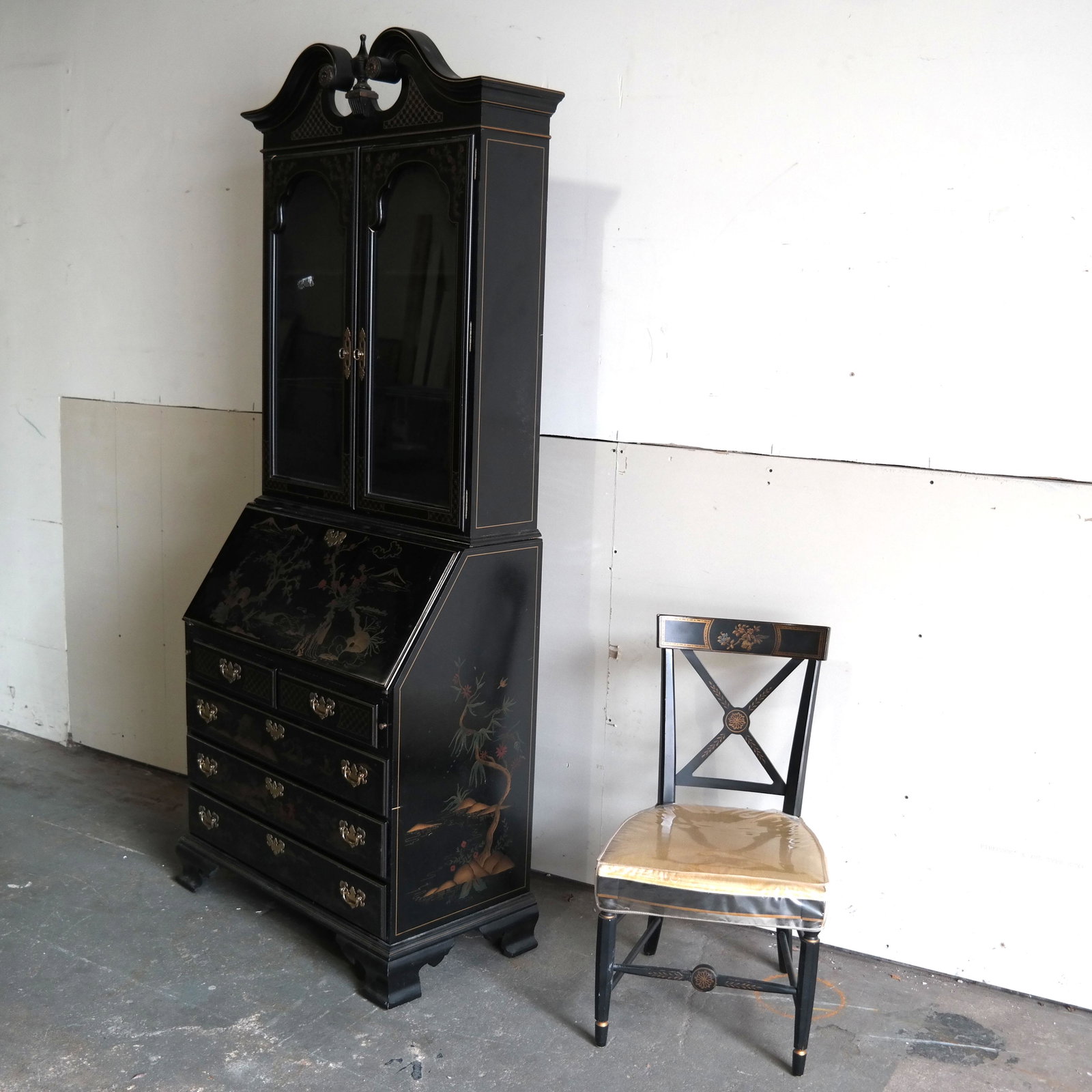 Coromandel-Style Secretary with Chair: Serpentine front secretary, with Asian-inspired design on ebonized ground, fitted interior and swan neck pediment. [Secretary: 87" H x 36" W x 20" D; Chair: 34" H x 19" W x 21" D].