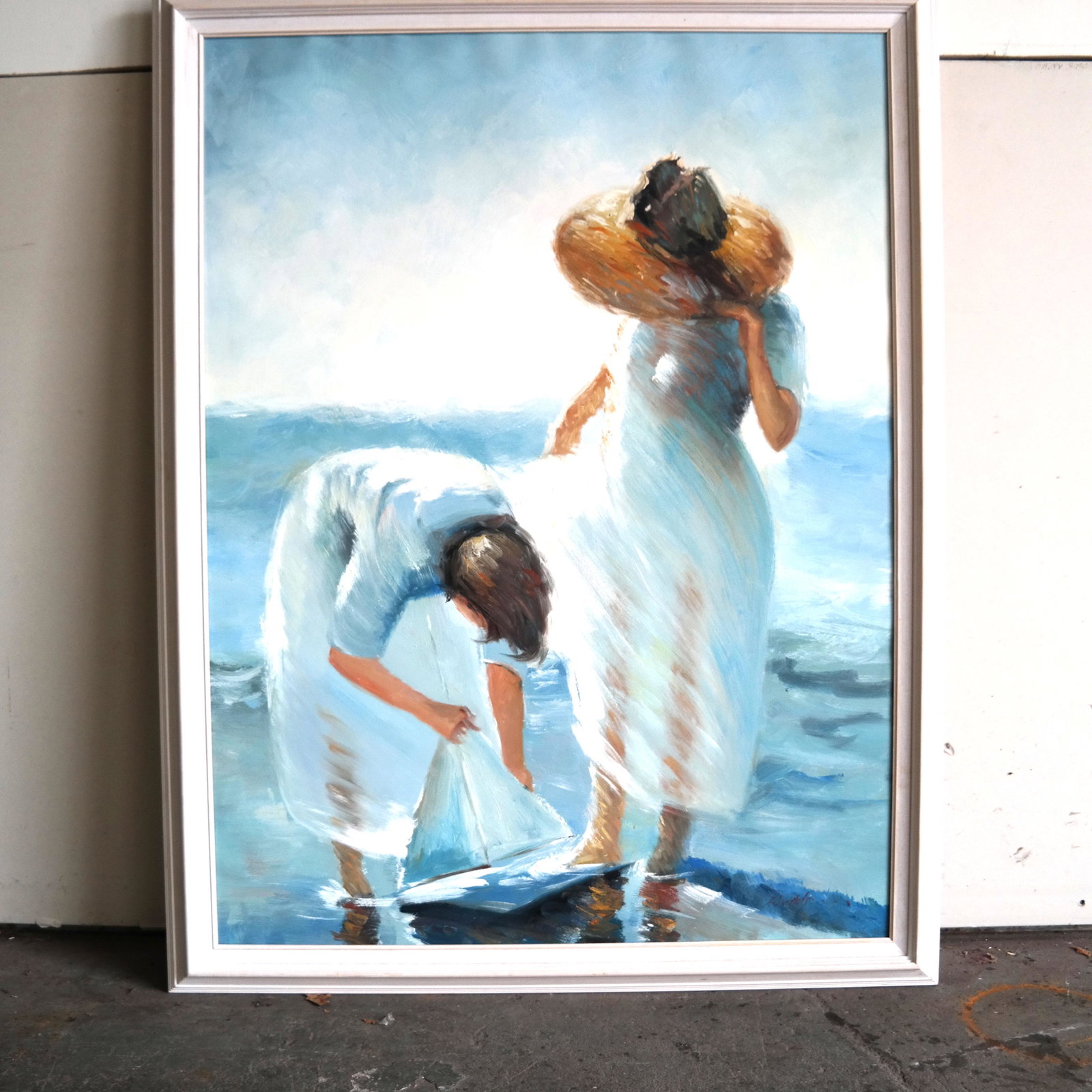 Impressionist-Style Beach Scene - Painting: Oil on canvas painting of figures on a beach with a toy boat, signed illegibly lower right. [Art: 47" H x 35" W; Frame: 53" H x 41" W].